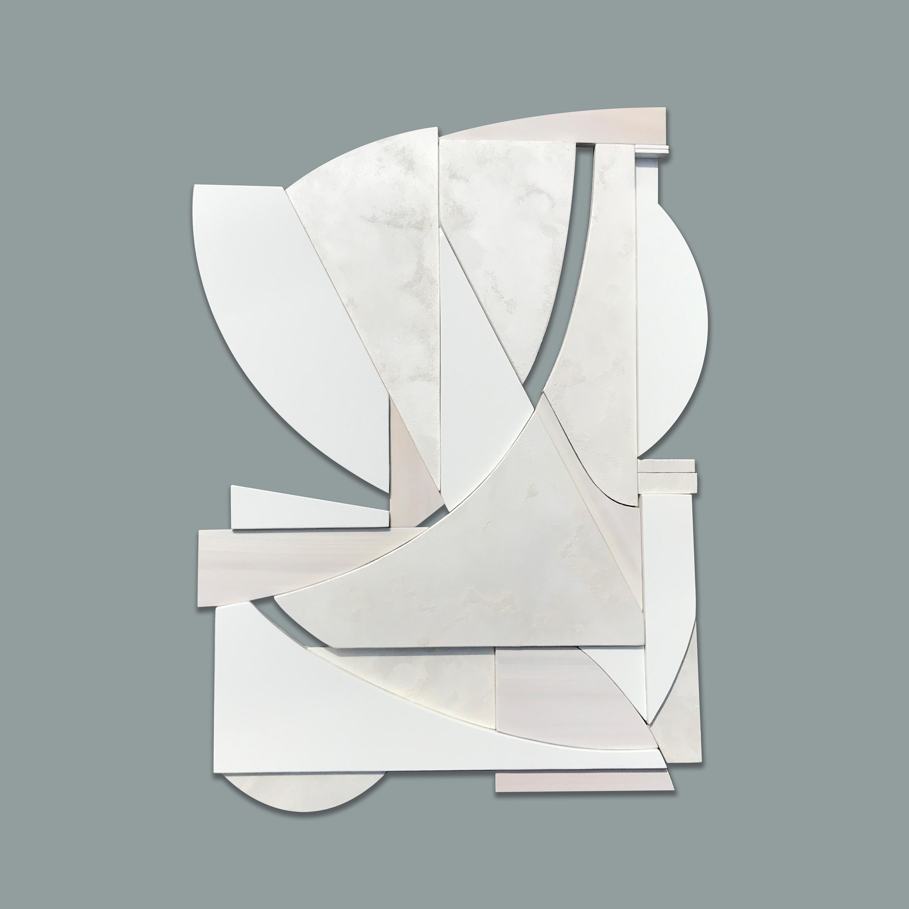 Blanco is a monochrome and elegant minimalist art deco wall sculpture. It is constructed with high-end birch plywood, acrylic washes and completed with a hand waxed finish. The acrylic wash allows the Blanco is a modern mixed media wall sculpture.