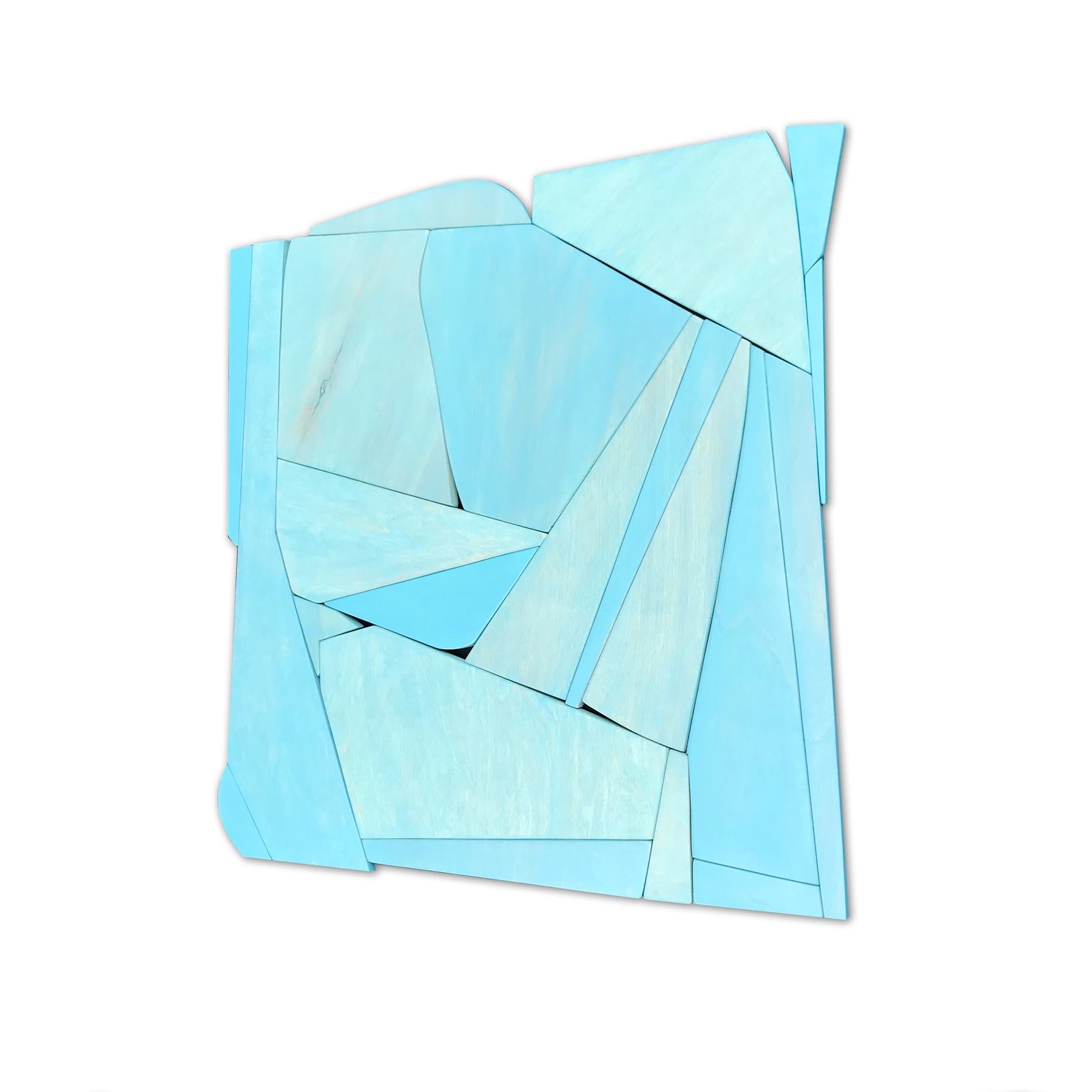 Blue is a discreet and elegant minimalist contemporary wall sculpture. It is constructed with high-end birch plywood, acrylic washes and completed with a hand waxed finish. The acrylic wash allows the wood grain to show through the paint and creates