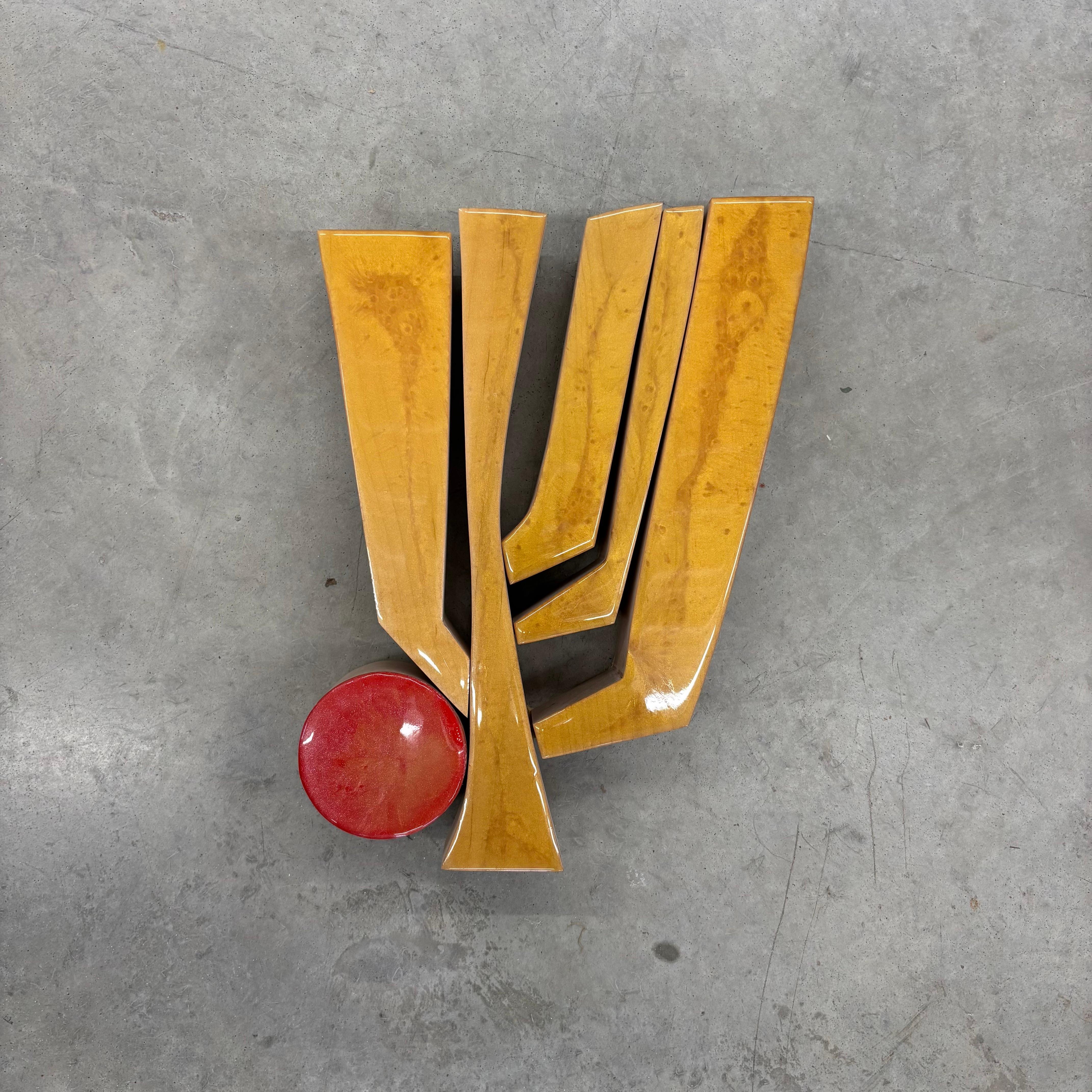 "Maize II" - (Scott Troxel
s Small Pops Series) is a minimalist modernist wall sculpture that can bring bold statement to wherever it is placed. The piece is relatively small, but it feels much larger due to the rich ochre lacquer paint with