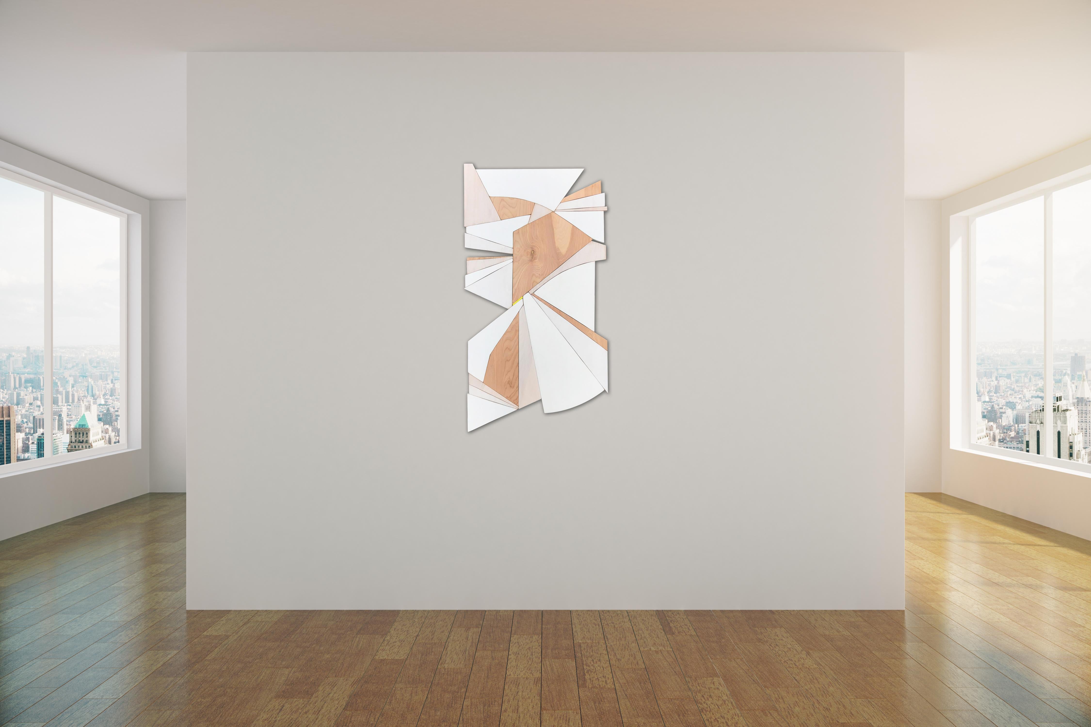 
Trapeze3 is a discreet and elegant, minimalist, monochromatic, contemporary wall sculpture. It is constructed with birch panels, acrylic washes and completed with a satin lacquer finish. The paint is slightly distressed giving the piece more