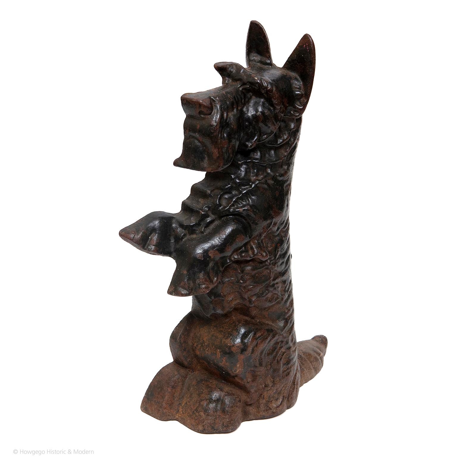 - Rare and unusual cast iron doorstop modelled as a Scottie dog sitting upright on all fours.
- Lovely original patina
- Charming and functional object.
- Great conversation piece