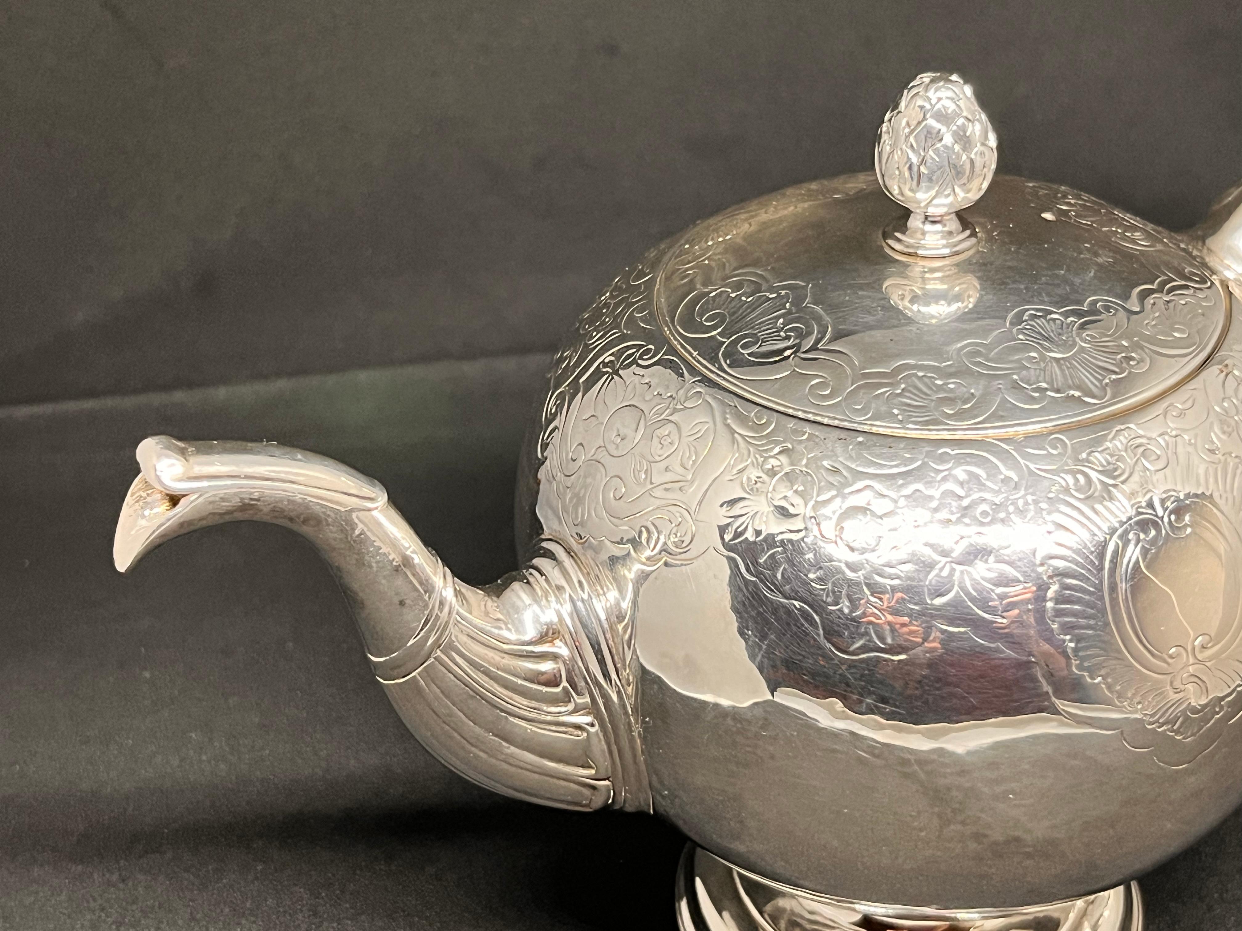 Scottish. A Rare Mid-Eighteenth-Century George II Rococo Silver Bullet Teapot. 6