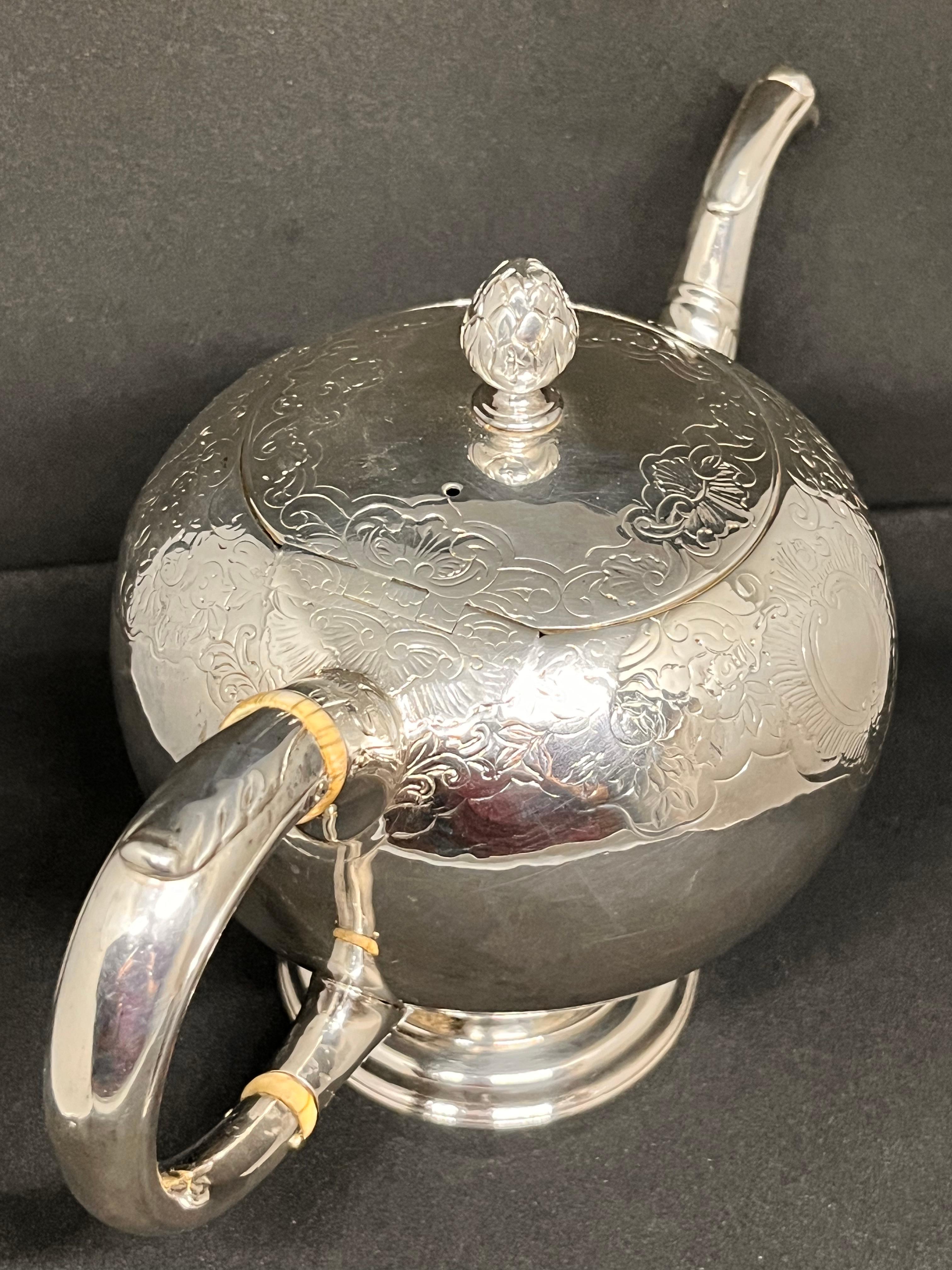 Scottish. A Rare Mid-Eighteenth-Century George II Rococo Silver Bullet Teapot. 3