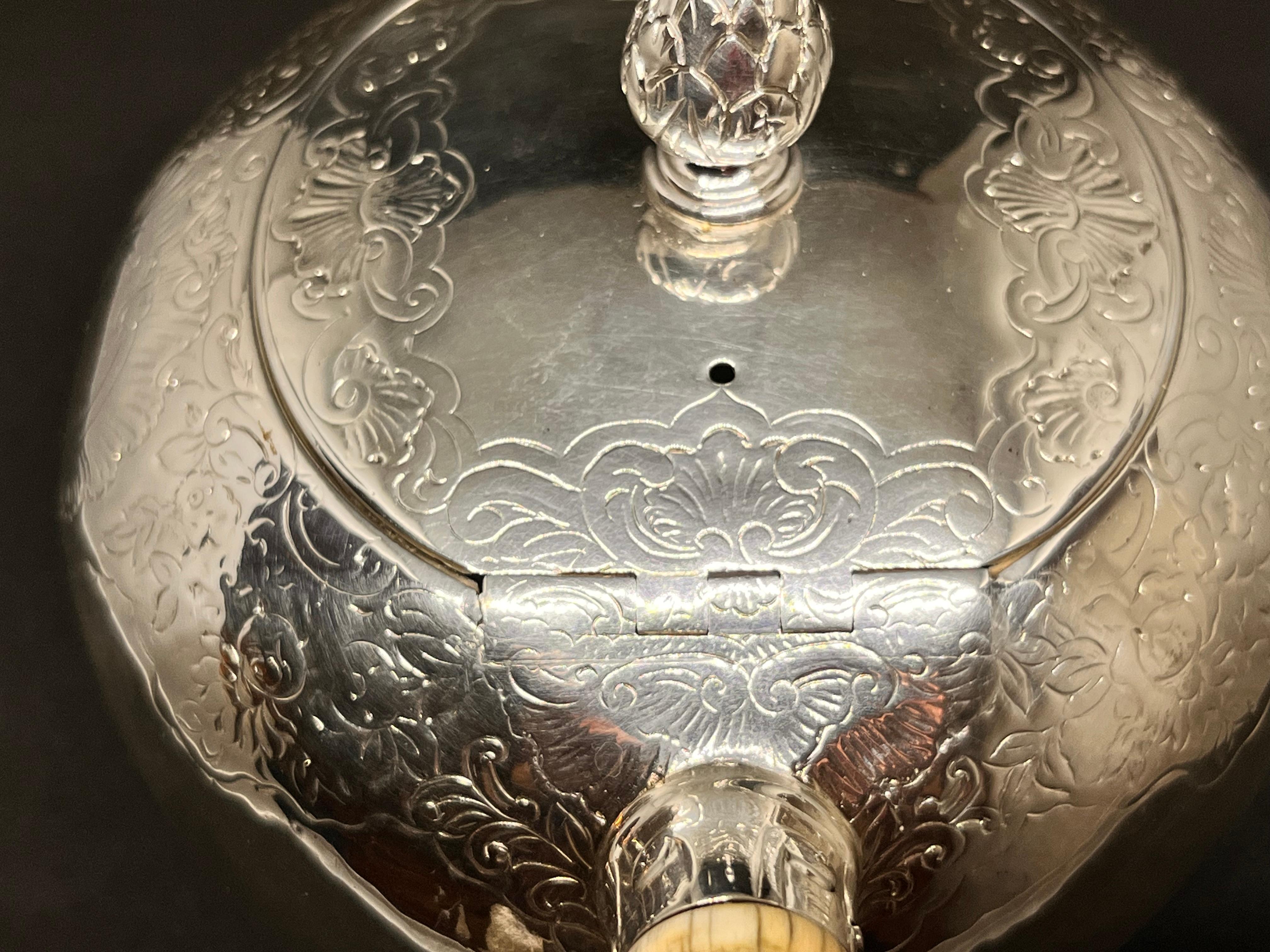 Scottish. A Rare Mid-Eighteenth-Century George II Rococo Silver Bullet Teapot. 5