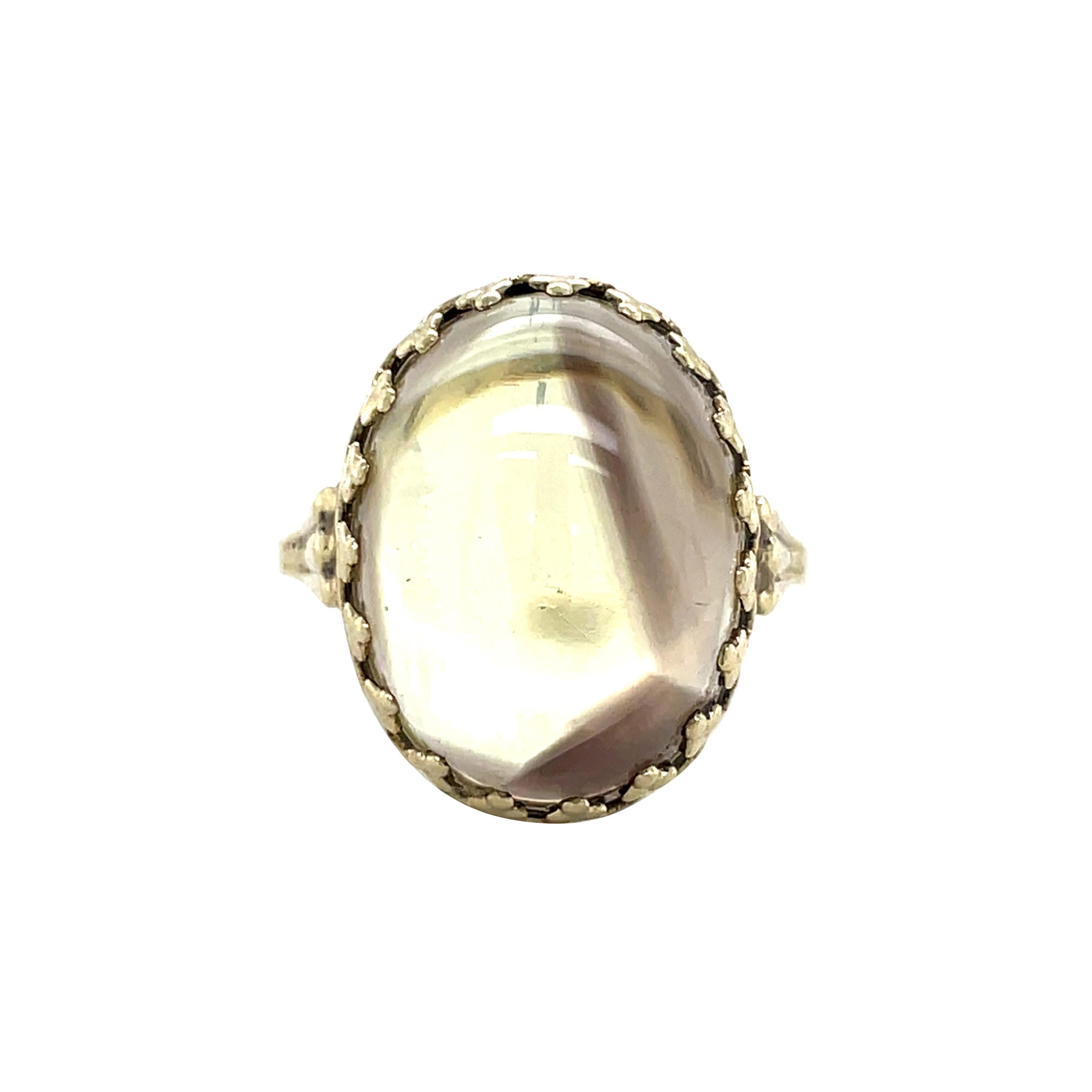 A magnificent Scottish cairngorm gemstone is center stage in this exquisite, regal ring. This 8K gold ring came to us with a very damaged stone originally, so we worked with a local Amsterdam lapidary to give this jewel new life and save it from