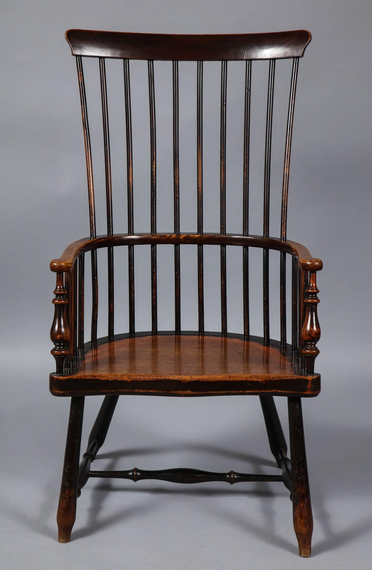 Fine 19th century Scottish Windsor comb back armchair, the simple crest over spindle back, over shallow 