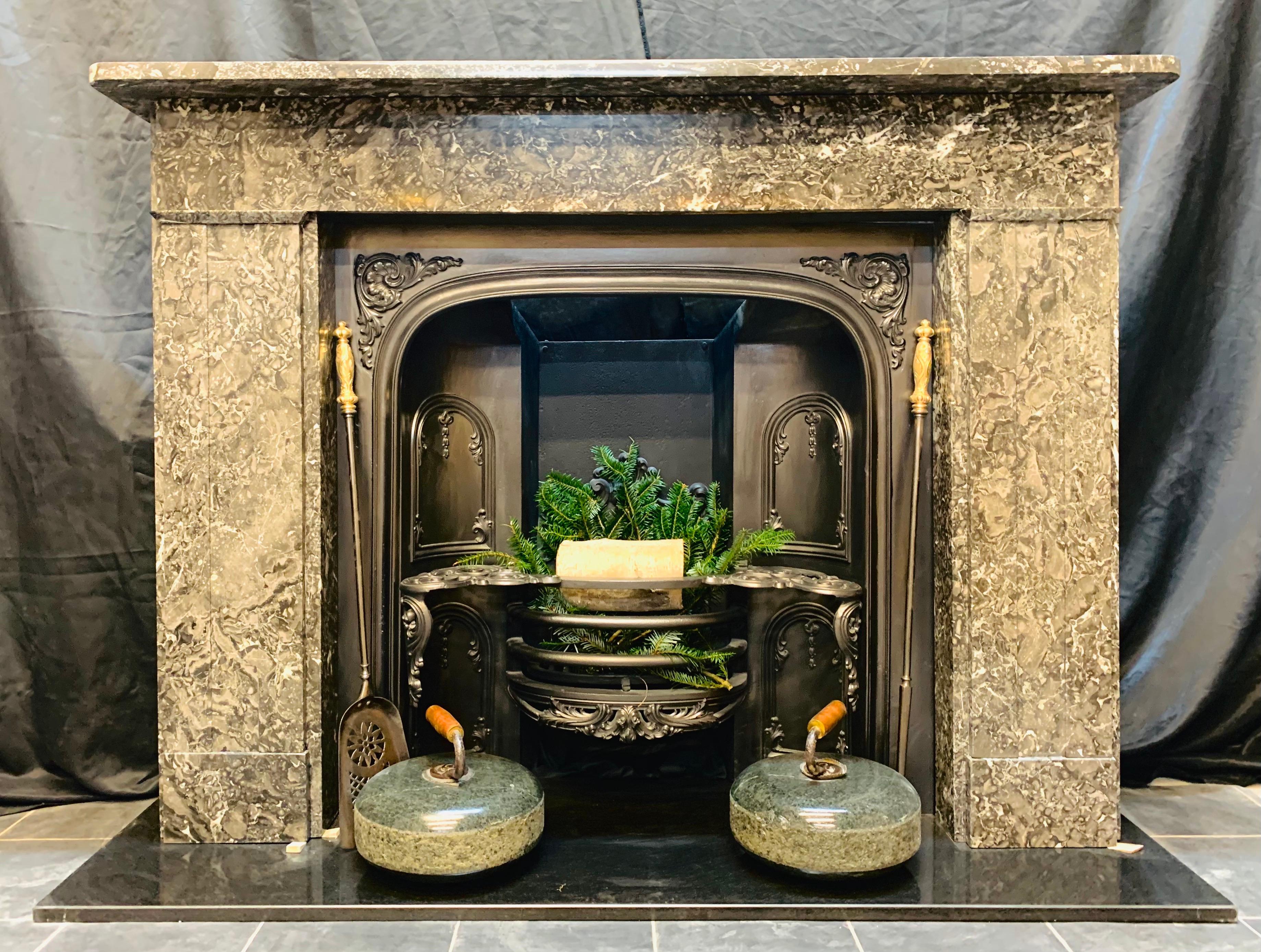 A splendid Scottish (Edinburgh) early 19th century Georgian Ashburton marble fireplace surround. Ashburton marble was mined in Devon, it has a distinctive pattern and shows various colours, this example is mottled, or variegated Ashburton, A