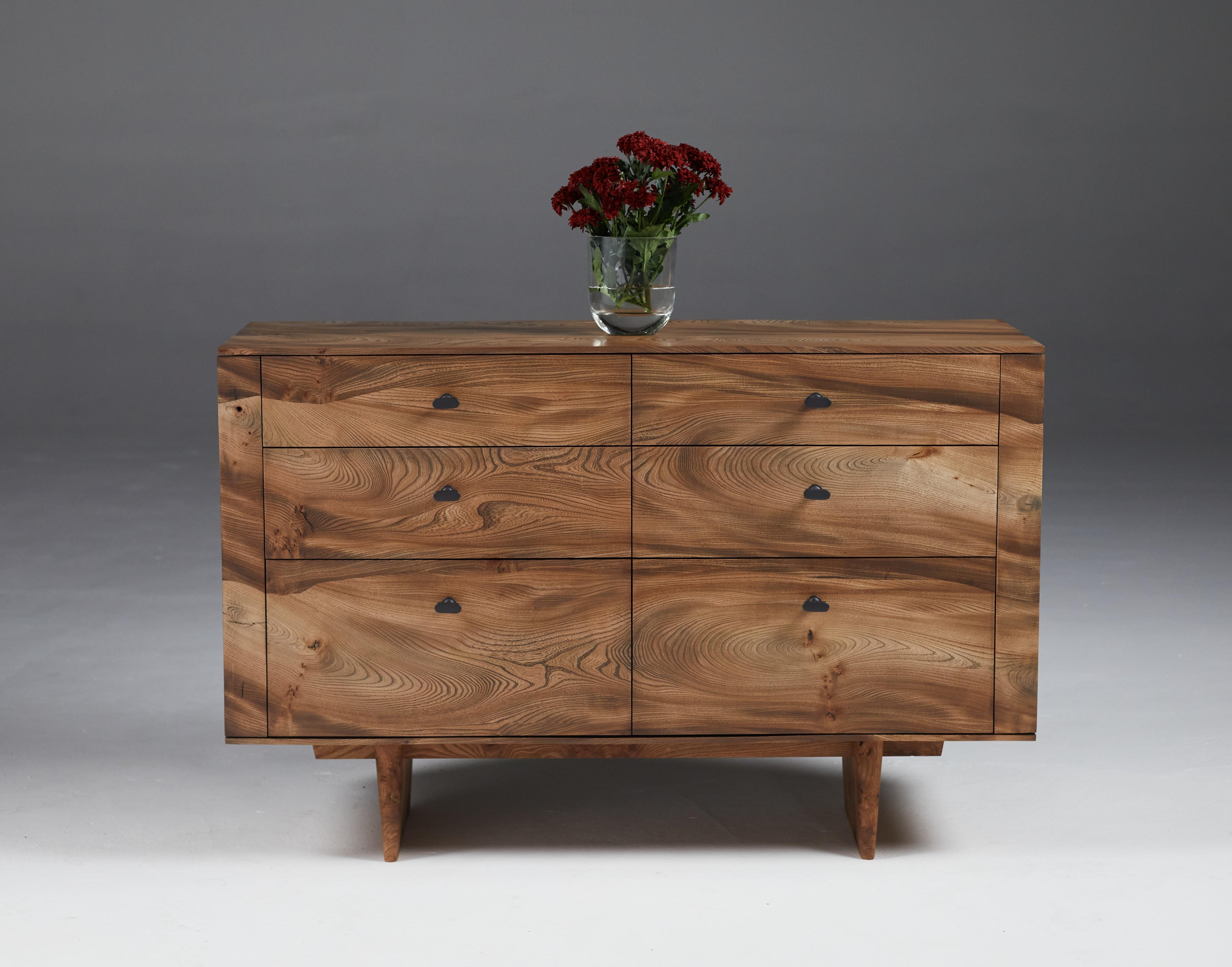 Chest of Drawers in Scottish elm. 

Size:  1220 mm  L x 400 mm W x 795 mm high.
With bronze drawer pulls, oak internal drawer boxes of solid oak and fully extendable soft close runners. 
Made in January 2023, The consecutive project number 332 and