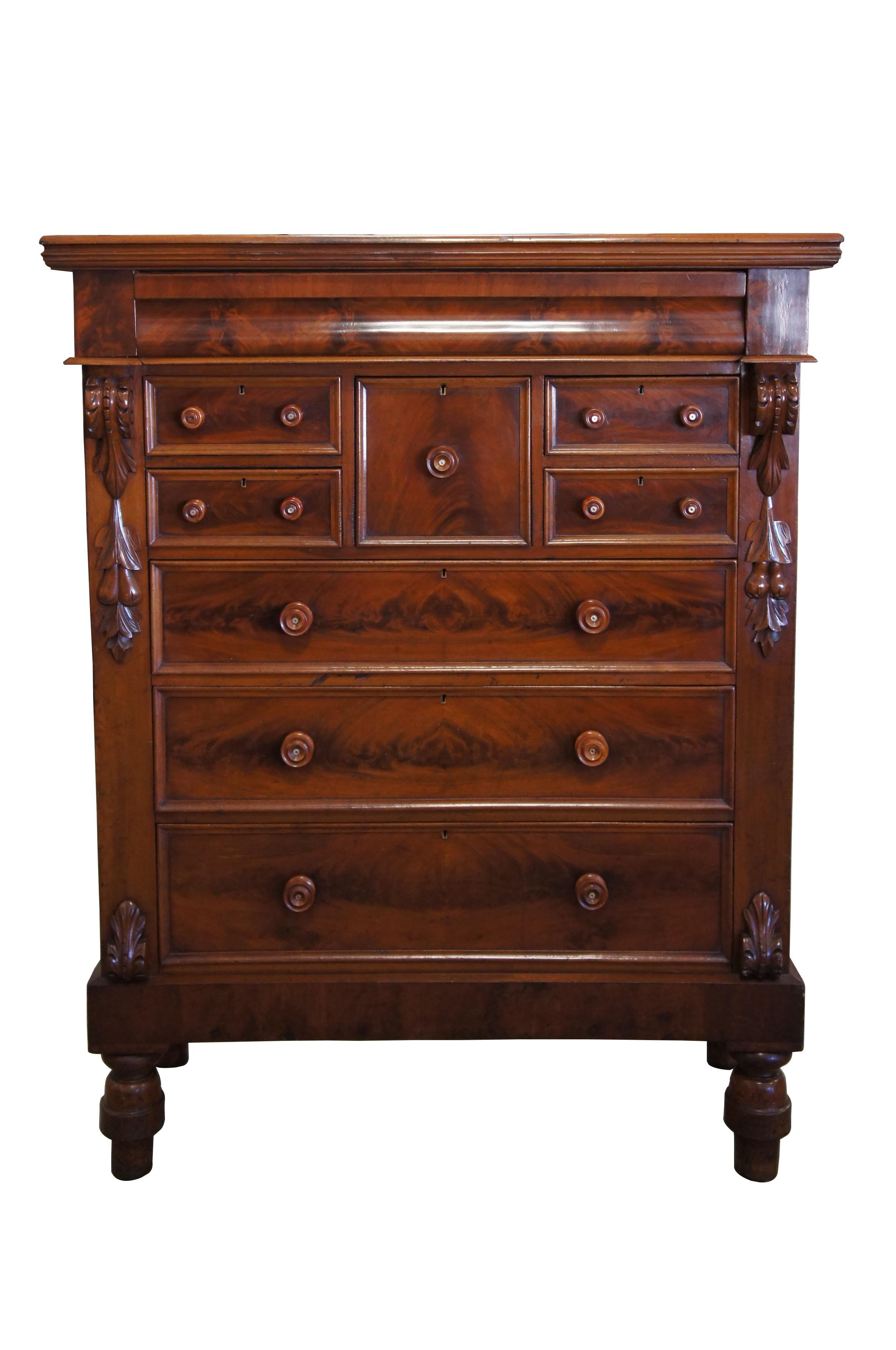 Scottish flamed mahogany antique 1850s Empire highboy dresser chest of drawers

An exceptional example of Scottish craftsmanship. This monumental Empire chest of drawers draws you in again and again. Made from crotch mahogany with extraordinary