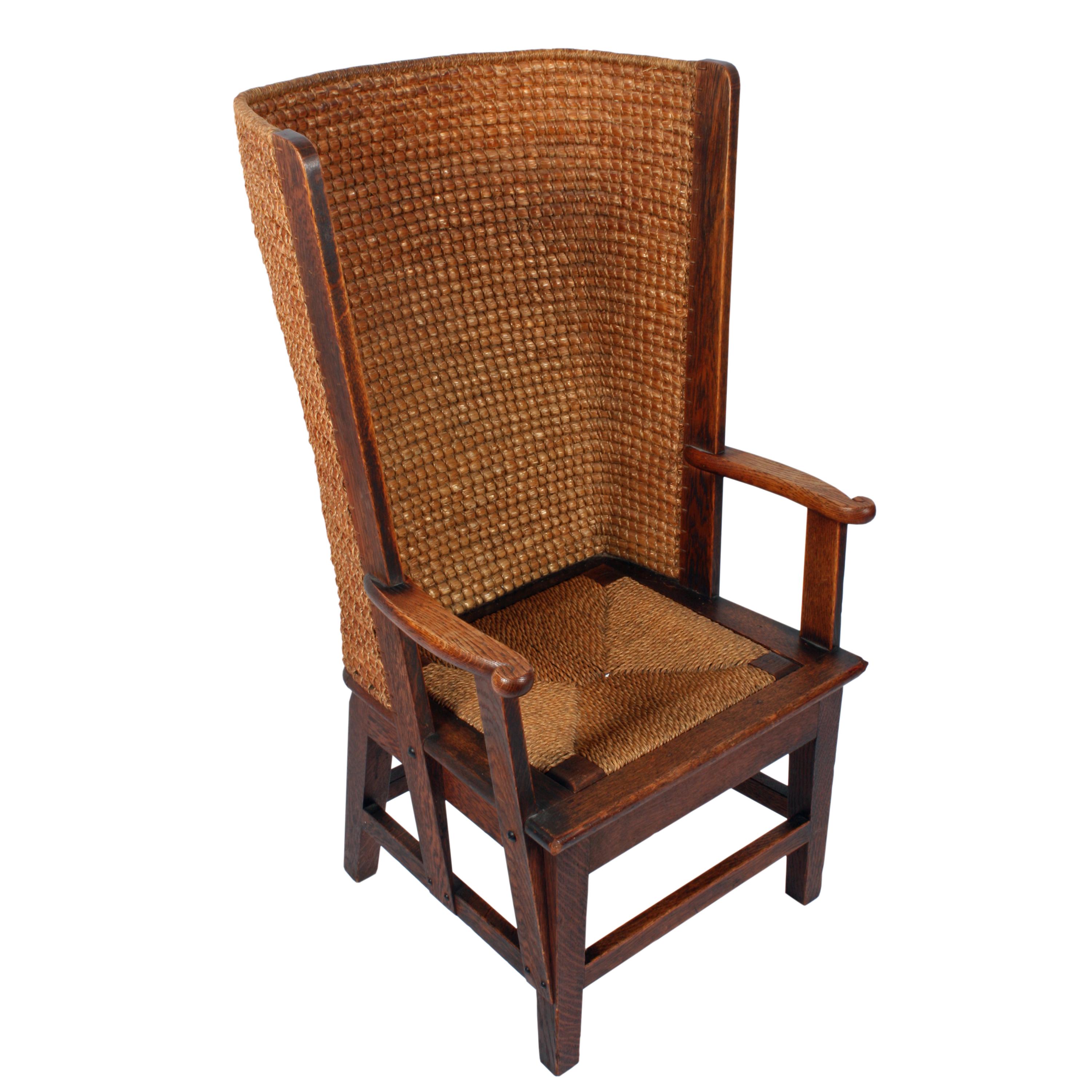 A late 19th-early 20th century large oak Scottish Orkney chair.

The back is constructed from black oat straw and bent grass, bound together with cord made from twisted bent grass.

The back is almost straight for around 10 rows of straw weave