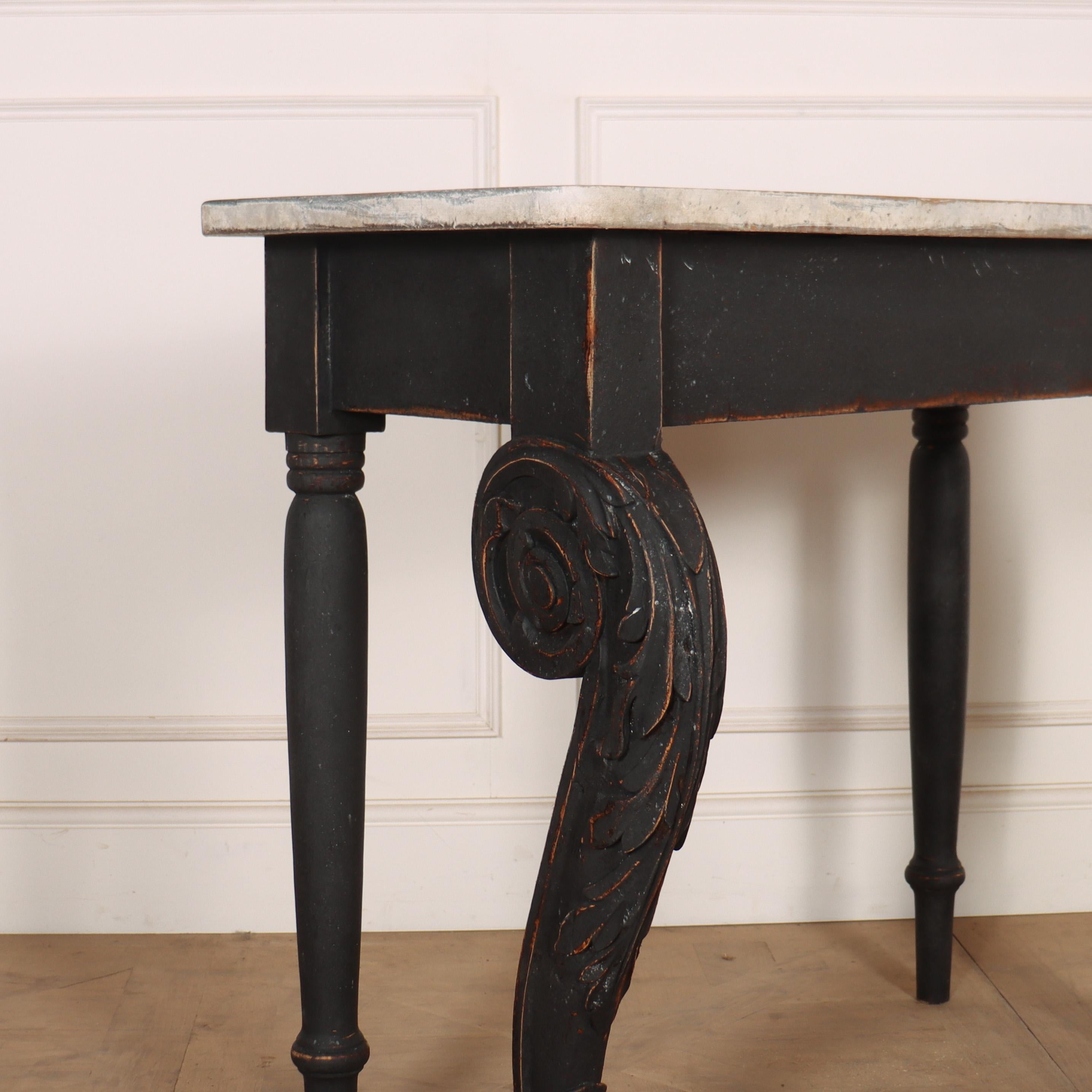Early 19th C Scottish painted pine console table with a faux marble top. 1830.

Top depth is 18