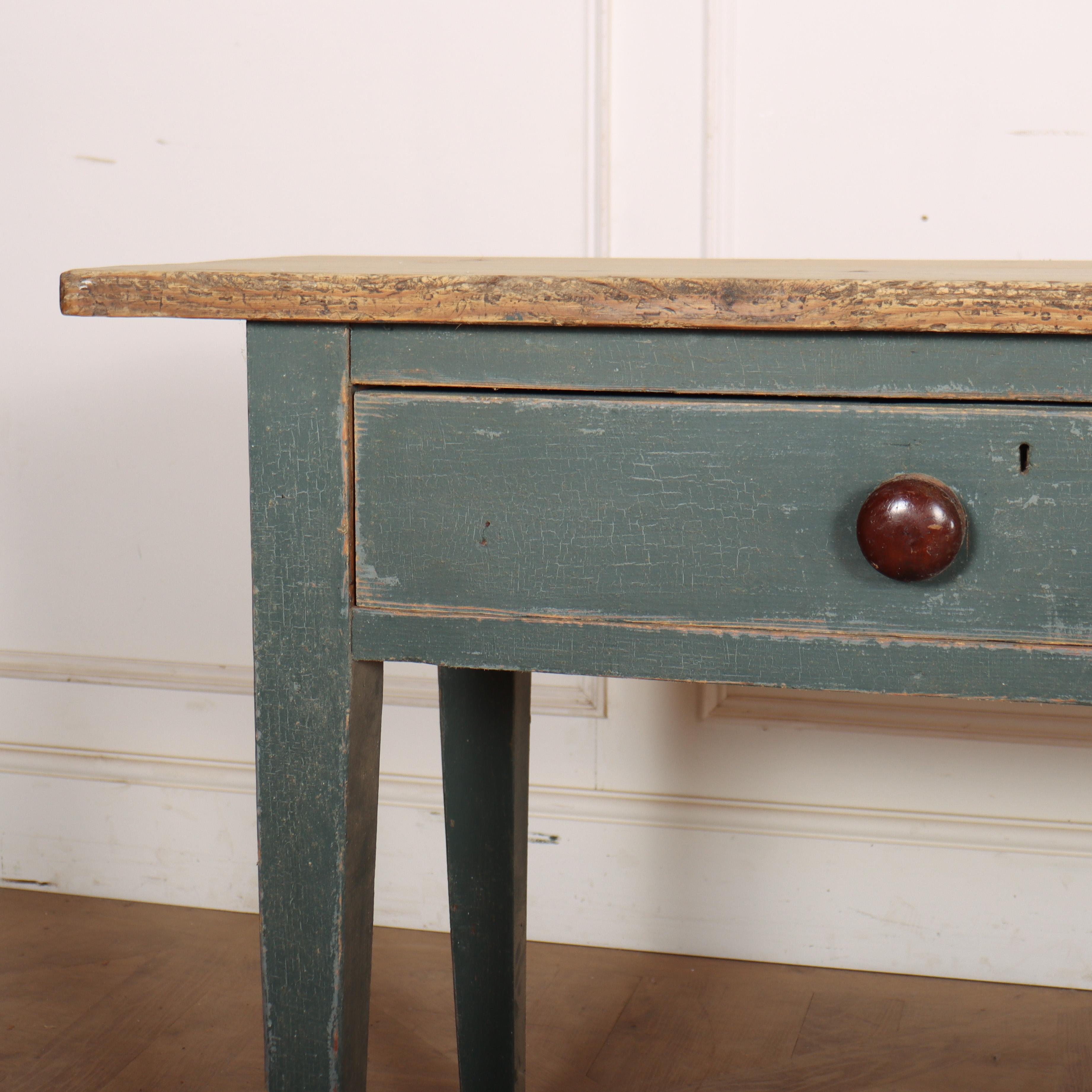 Early 19th century Scottish two drawer painted console table with a scrubbed pine top. 1860. 

Code: 9066

Dimensions:
W: 67