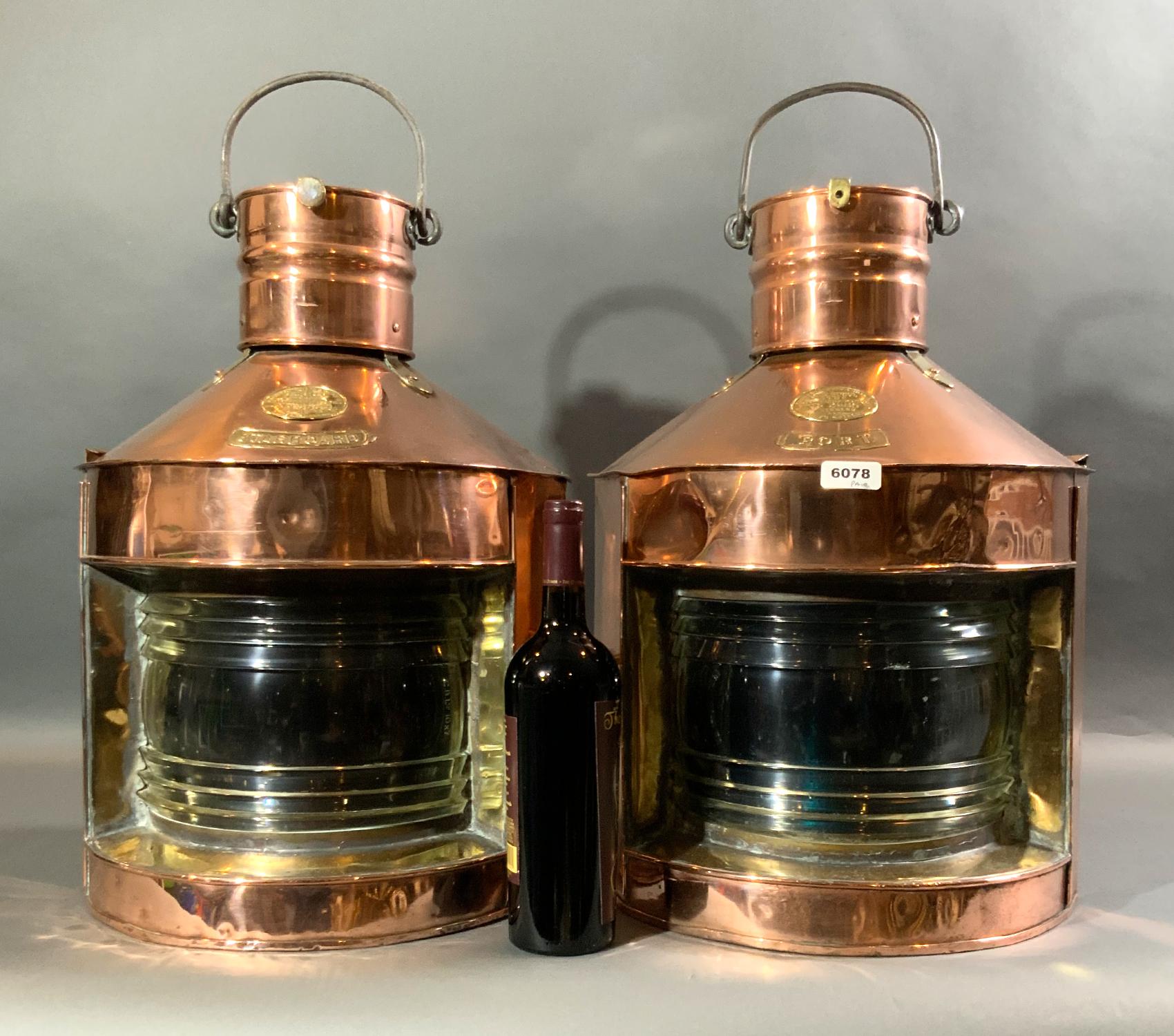 Fine massive pair of Scottish port and starboard ship’s lanterns of solid copper with brass trim. The glass Fresnel lenses have some chips and flakes from years of use. Brass badges read Richard Irvin and Sons LTD., ship store merchants and lamp