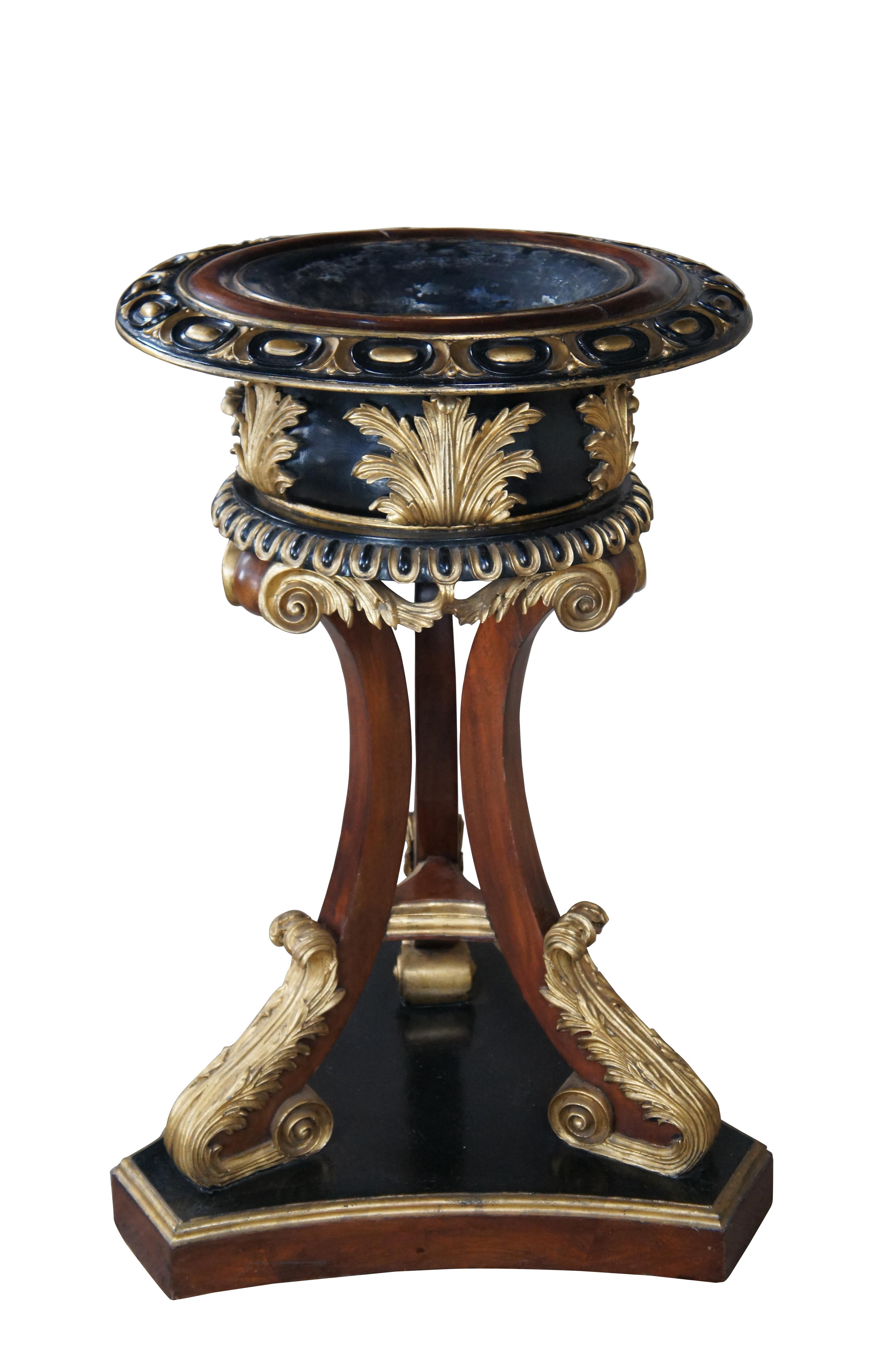 An exquisite Scottish Regency style jardinieres or planter in the manner of William Trotter, circa 19th Century. Constructed from mahogany with a parcel-gilt and ebonized finish. Features a circular basin with a border of cabochons above a shaped