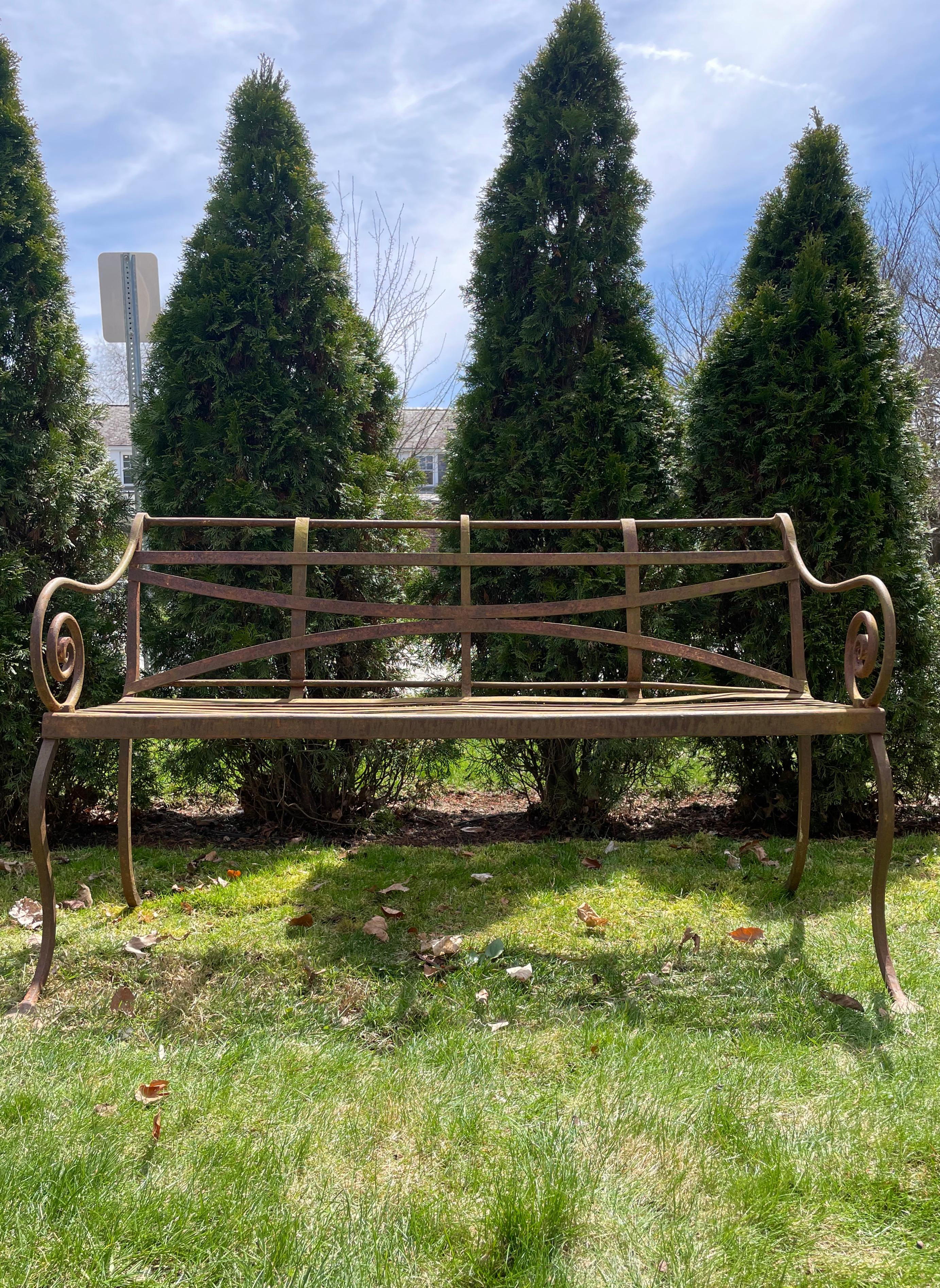 This is a wonderful Scottish Regency bench, in a lightly-rusted surface with traces of original paint and primer, and extremely comfortable. In mint antique condition, with no repairs or restoration, its classic design and exceptional hand-crafting