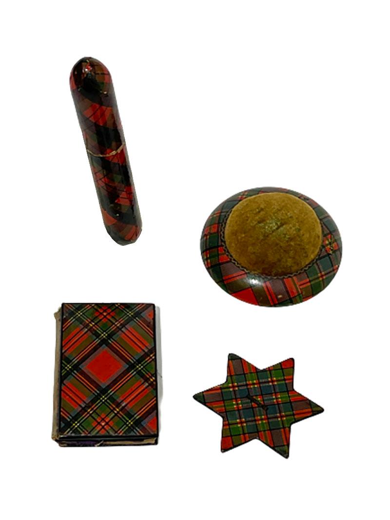 Scottish sewing set of Tartan ware, 19th century

Set of 4 items of Tartanware, Scottish sewing set, exists of a silk winder, marked by Mc. Farlane
A needle case not marked, a pin book also not marked and a pin cushion marked by Mc. Farlane
The pin