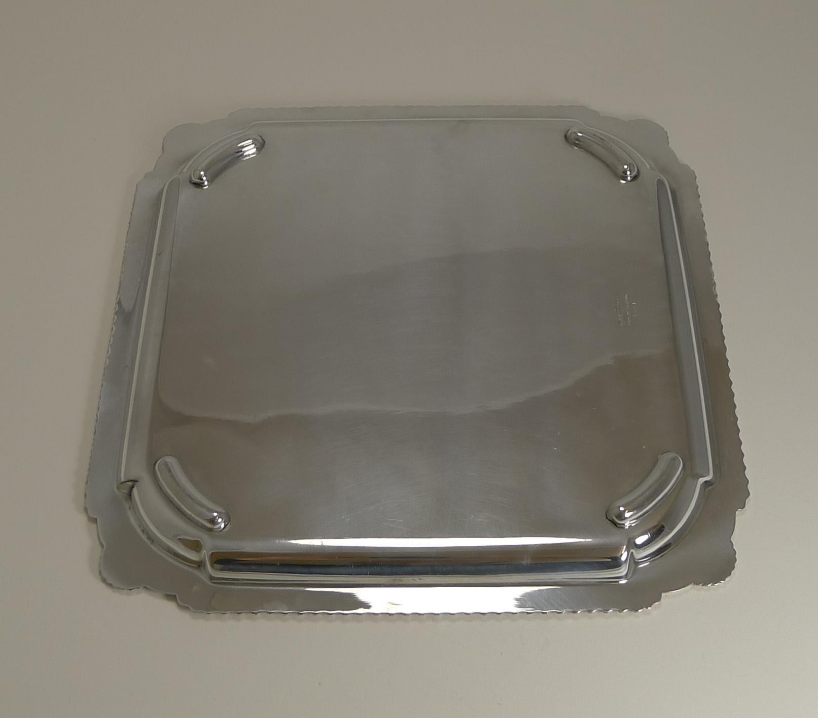A fine English silver plated square tray or salver, perfect to serve drinks and a perfect bar accessory.

The underside is where the full mark can be found for Davis and Son of Glasgow together with EPNS for Electro plated nickel silver and made