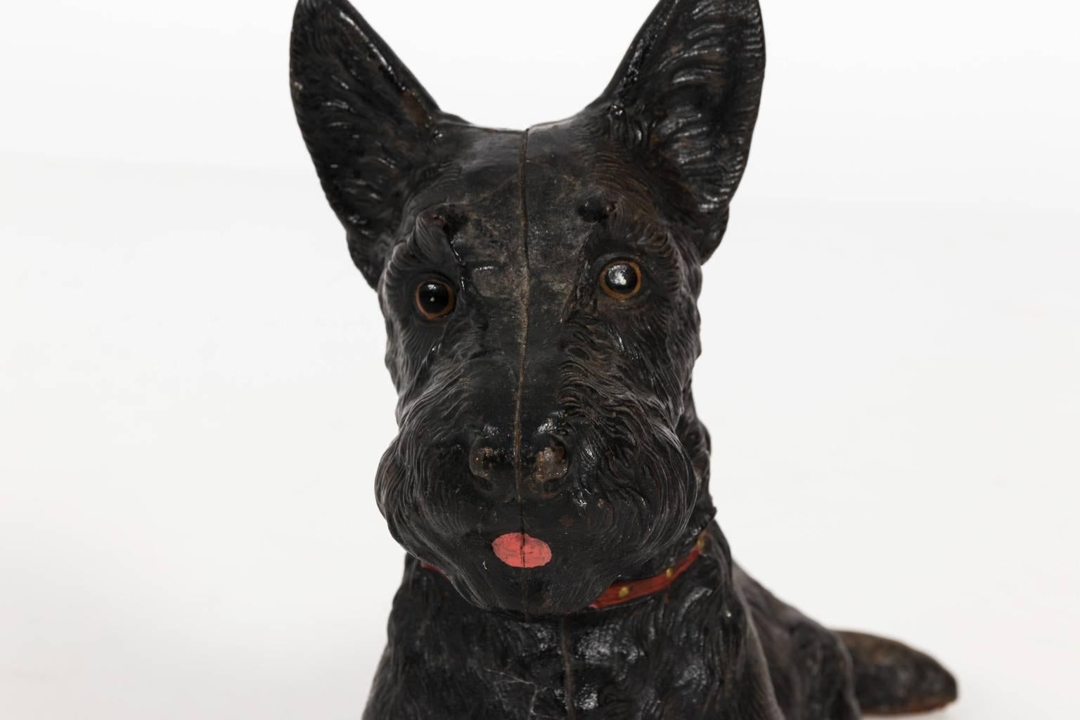 Vintage cast iron Scottish Terrier doorstop in a painted finish, circa late 20th century.
 