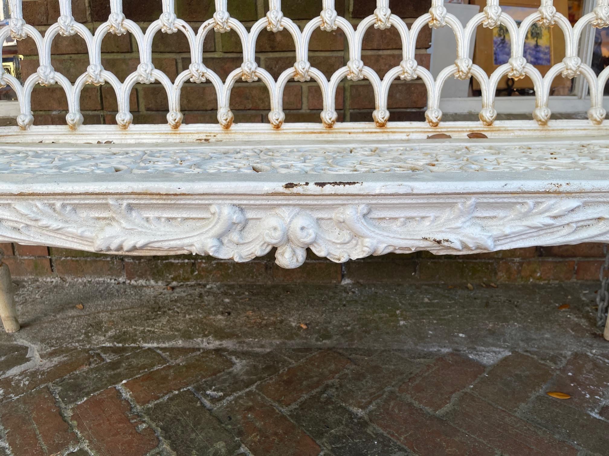 Scottish Victorian painted cast iron bench with scroll design and filigree seat with horseshoe motifs on back.
Possibly CARRON Co, Stirlingshire, Circa 1846.