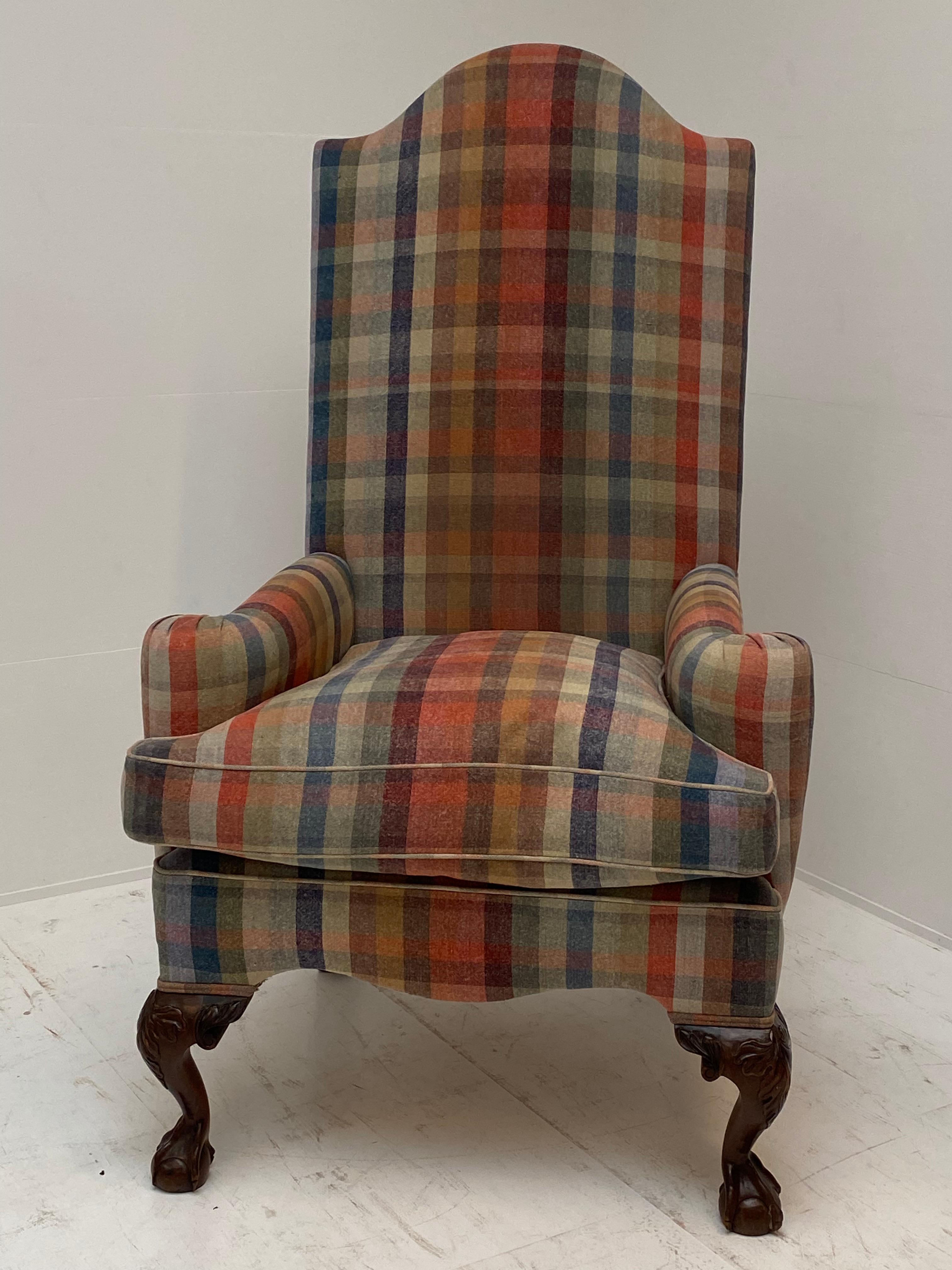 Very elegant Wing Chair with Mahogany Claw Feet,
new upholstered with a Scottish Tartan,
nice round back and open arms,
very comfortable seating
around 1920.