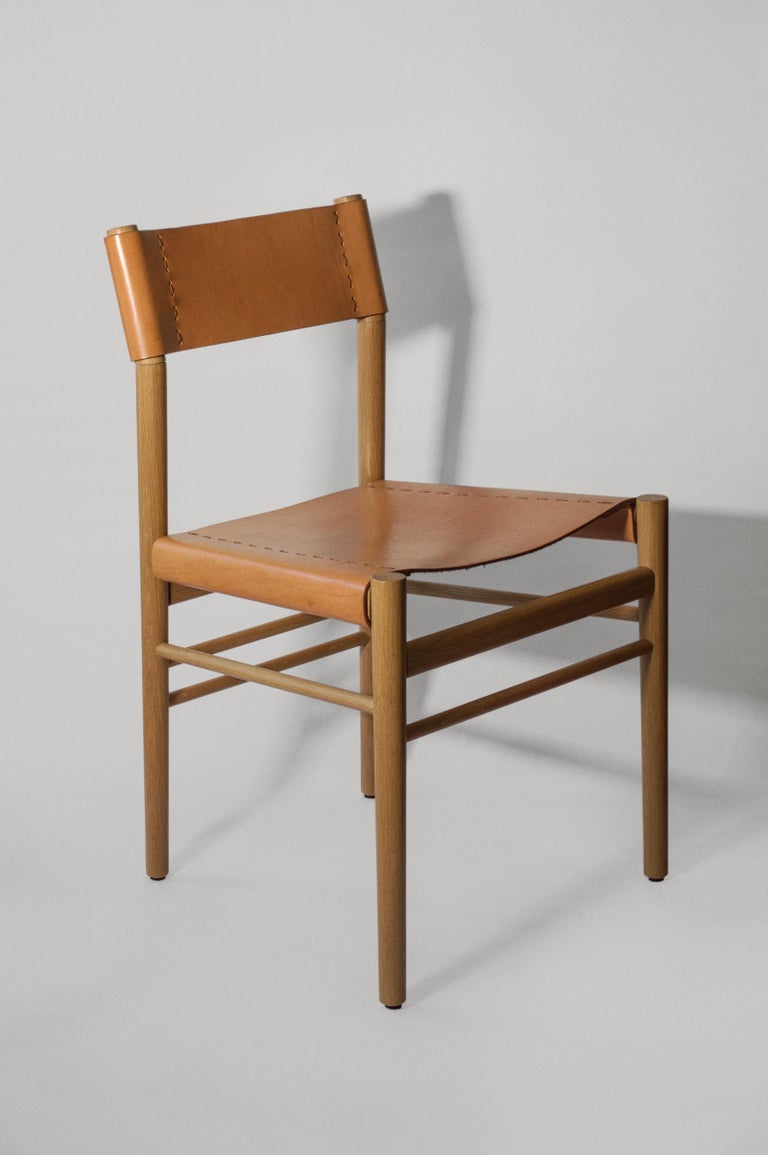Scriba is a seemingly simple, delicate dining or desk chair; made by traditional Japanese wood joinery, and artisanal saddlery: two disciplines where texture, craftsmanship, and the soft nature of materials are themselves an experience.

As with