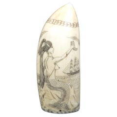 Antique Scrimshaw of whale tooth with vertically engraved mermaid mid-19th century