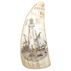 Scrimshaw of a whale tooth with vertically engraved lighthouse dated 1868 