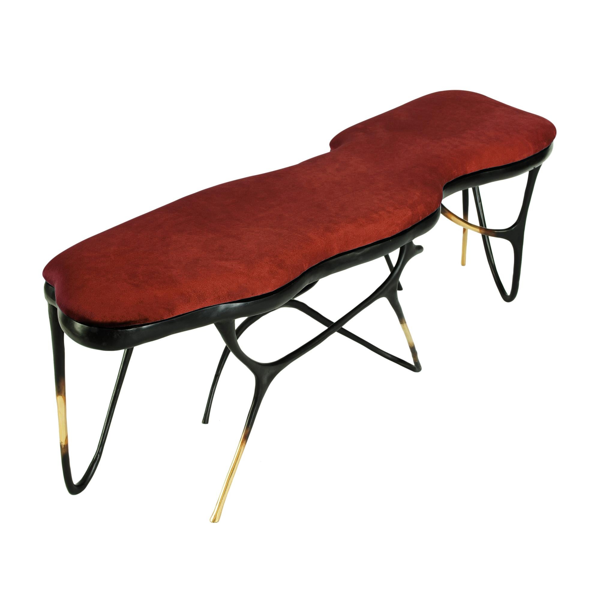 Elegant bronze bench with upholstered seat.
Can be customized to your specifications or COM.