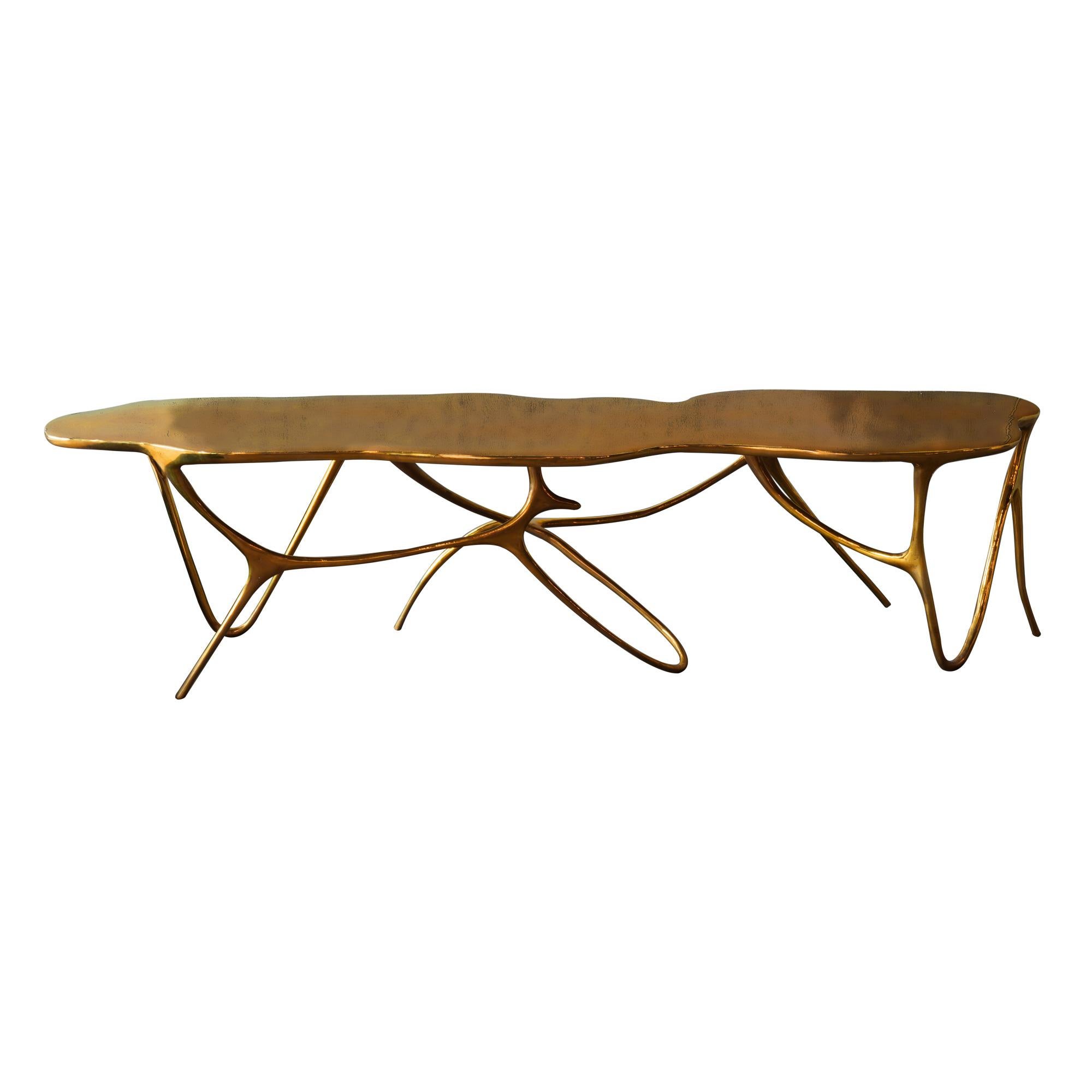 Elegant handcrafted bronze table or bench.
Can be customized to your specifications or COM.

Also available with an upholstered seat cushion.