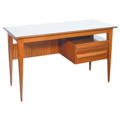Italian mid-century modern desk from the 1970s, made of wood, with a glass top