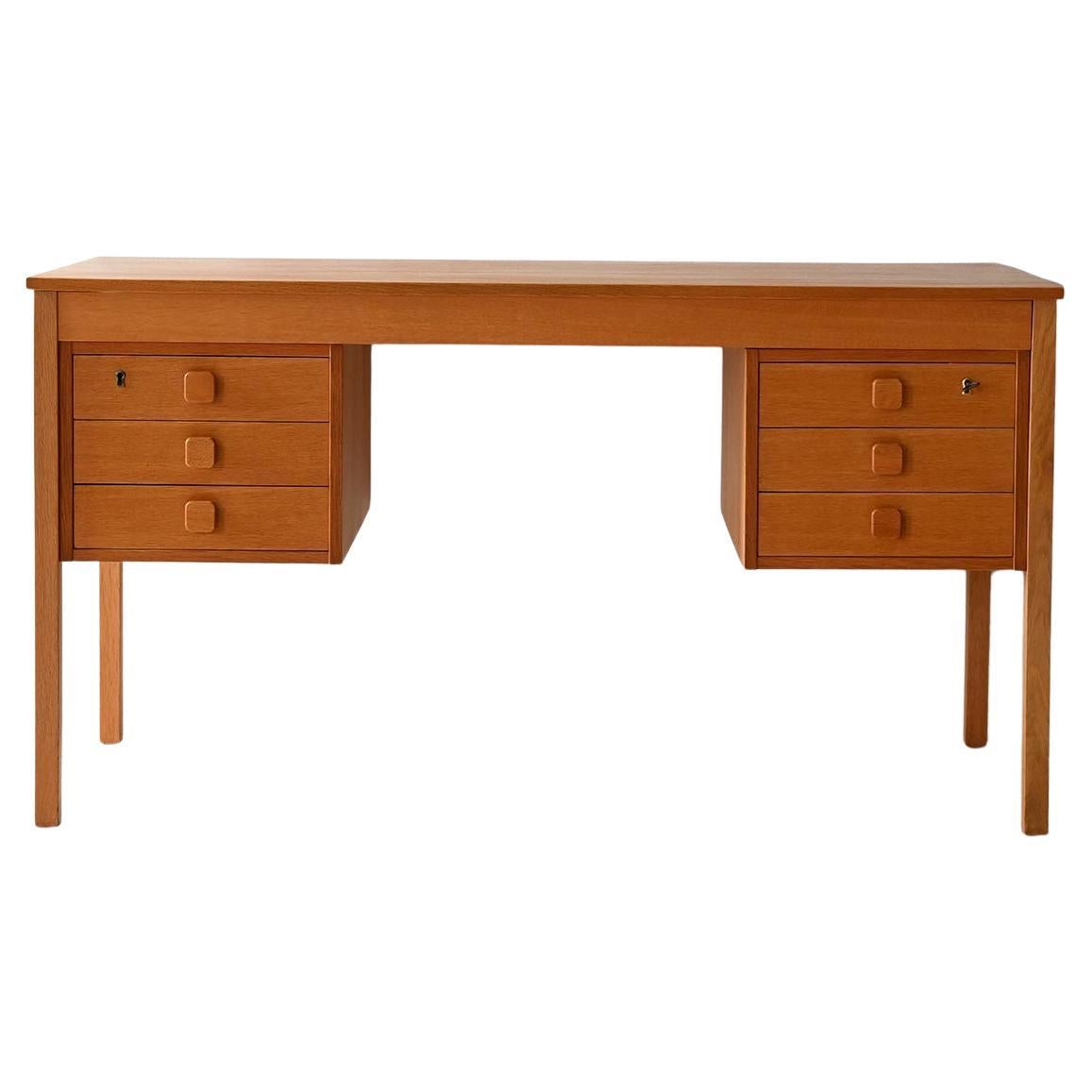 Danish vintage desk in light teak