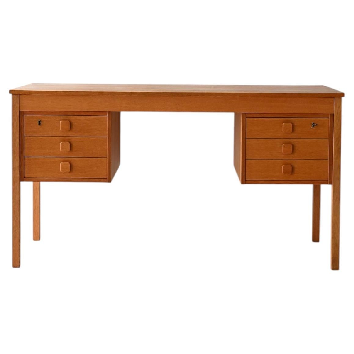 Danish vintage desk in light teak