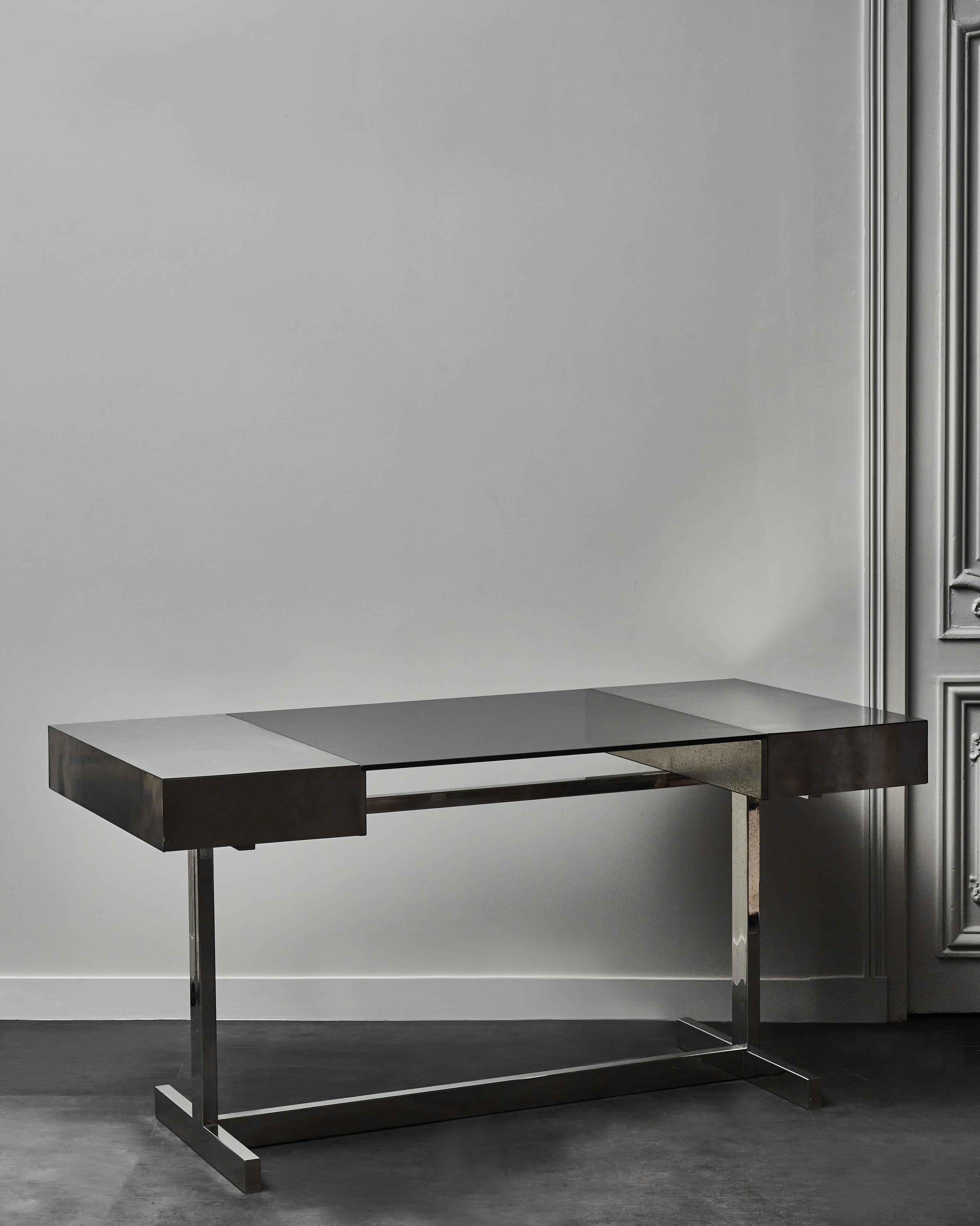 Great desk designed by Willy Rizzo and made in 1972, made of chromed steel feet, walnut drawers, brushed steel and smoked glass top.
Signed on the side and dated on the bottom. 
“27 Guigno 1972” or 27th of June 1972.
 