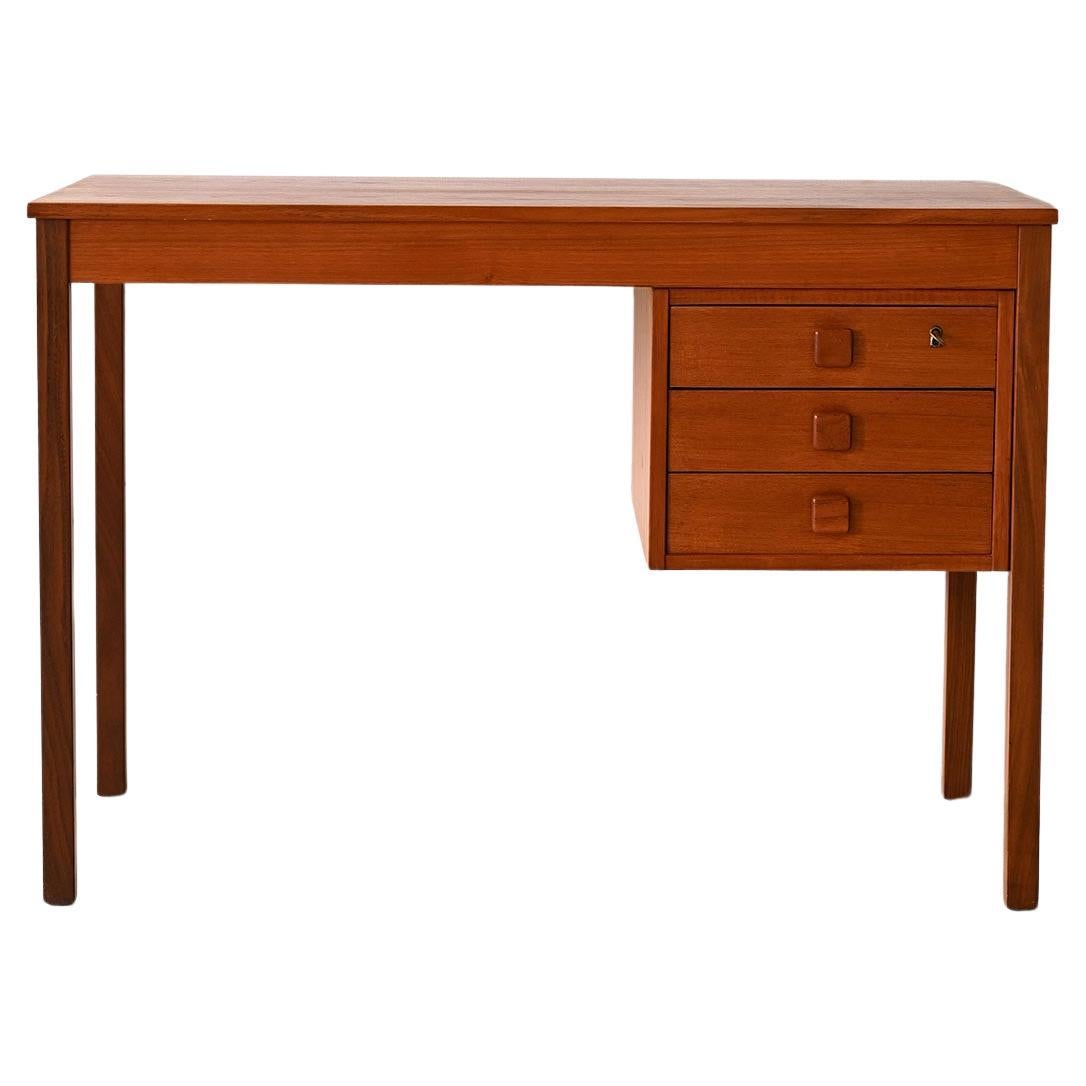Teak desk with 3 side drawers For Sale