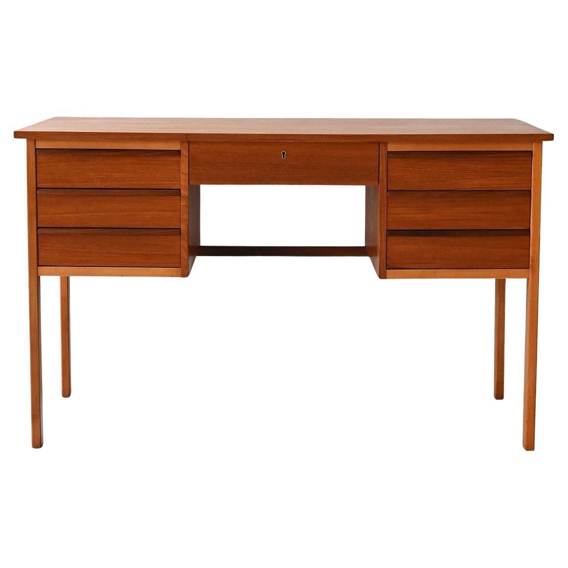 Scandinavian vintage teak desk with 7 drawers For Sale