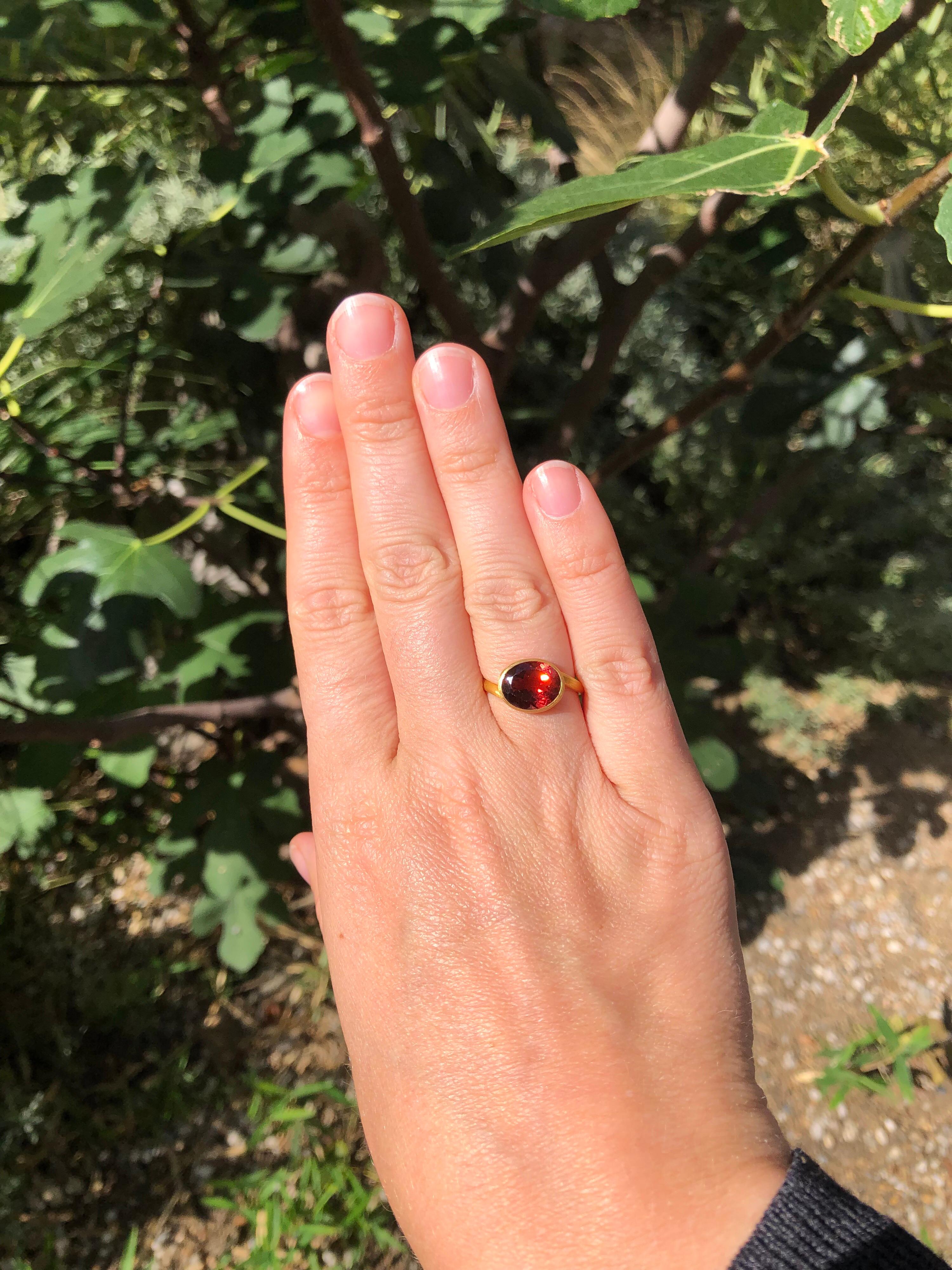 This delicate ring by Scrives is composed of a deep red tourmaline of 3.45 cts. 
This design allows light to come into the stone from multiple directions and put into highlight the stone. This ring design has been conceived to be worn adding with 2