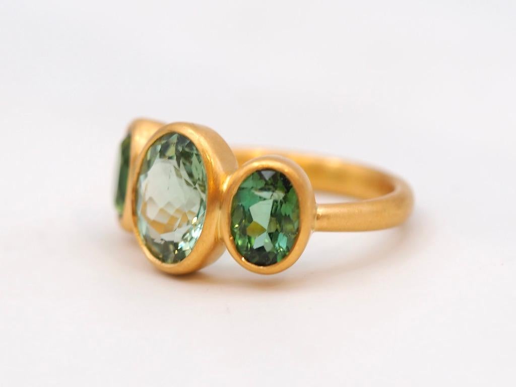 Women's or Men's Scrives 4.17 Carat Green Tourmaline Three Stones 22 Karat Gold Handmade Ring For Sale
