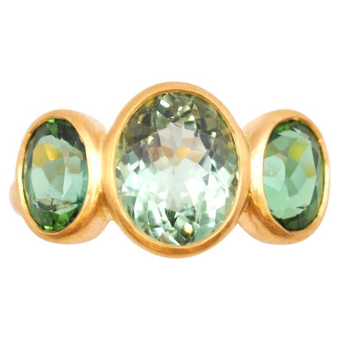 Scrives 4.17 Carat Green Tourmaline Three Stones 22 Karat Gold Handmade Ring For Sale