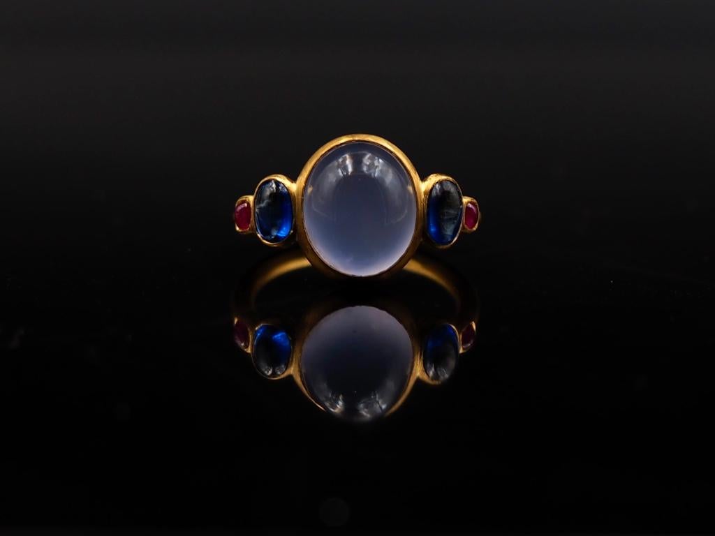 Contemporary Scrives 5.27 Carat Blue Chalcedony Kyanite Ruby Cabochon 22 Karat Gold Ring