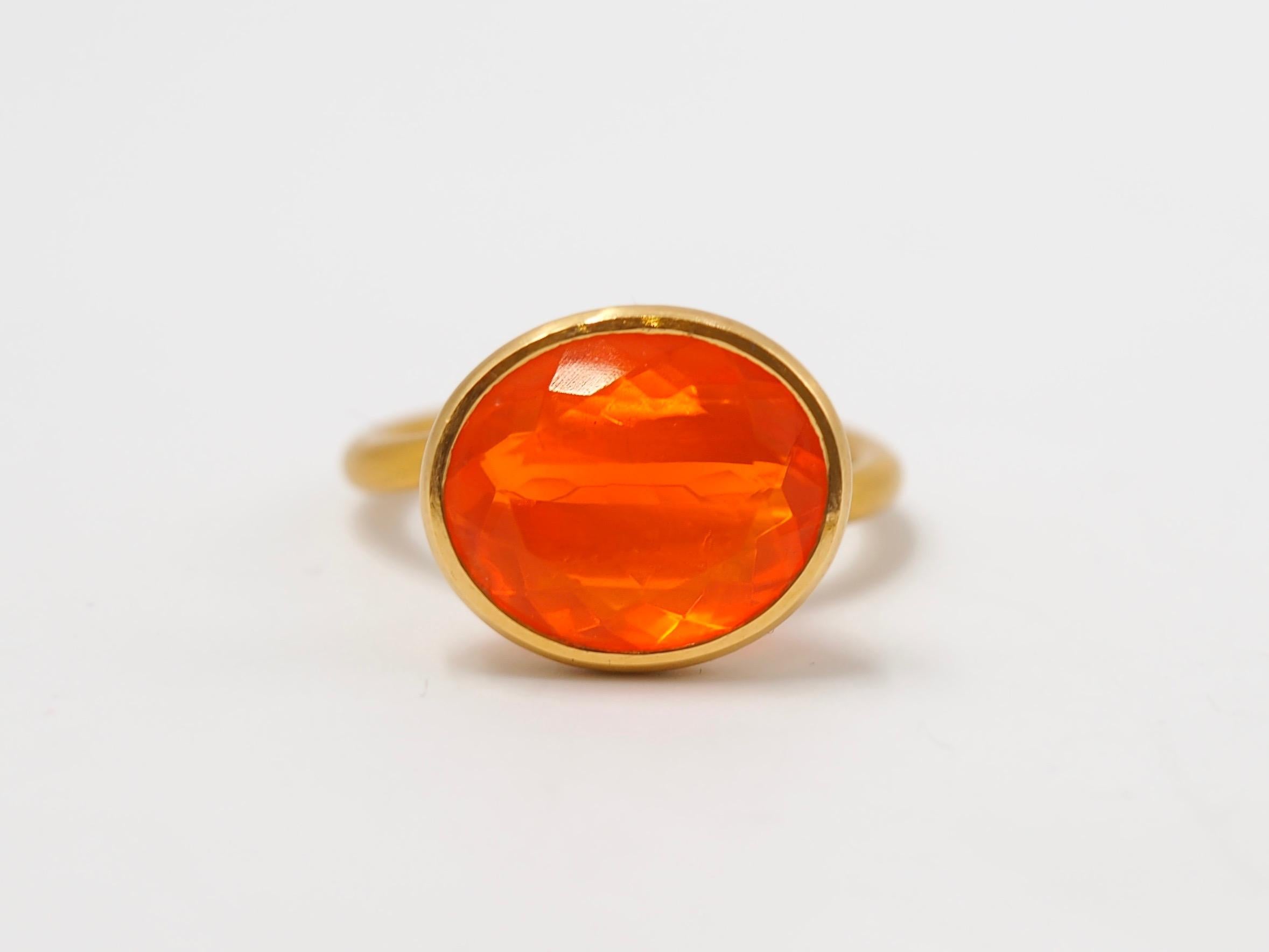 Oval Cut Scrives 5.87 Carat Orange Fire Opal 22 Karat Gold Ring