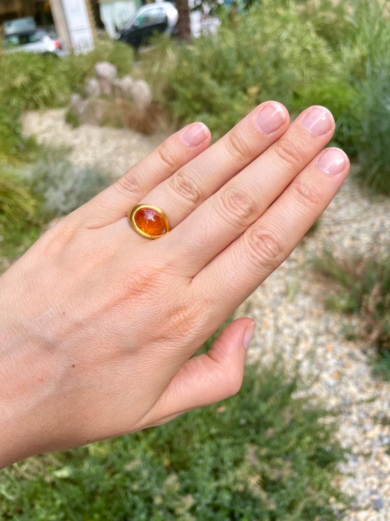 Contemporary Scrives 7.18 Carat Orange Mandarine Garnet Cabochon 22 Karat Gold Handmade Ring