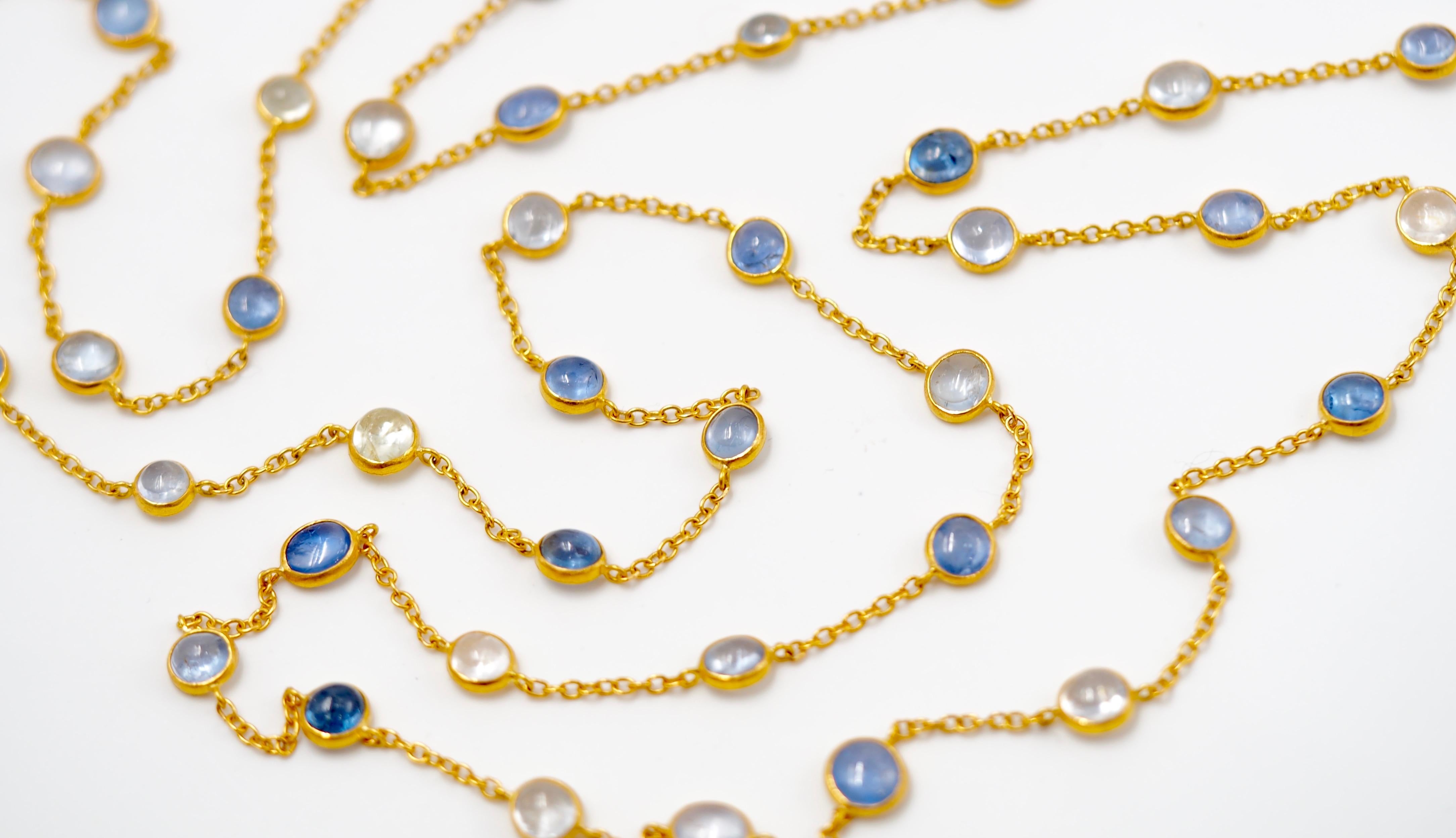 This necklace is composed of 33.52 cts of natural blue, yellow & white sapphires (unheated, origin: Myanmar) set on a gold chain. 
All stones are different in shape and in colour. The stones can exhibit visible natural and typical inclusions. 

The