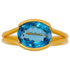 Scrives Blue Topaz Oval 22 Karat Gold Handmade Cocktail One of a kind Ring