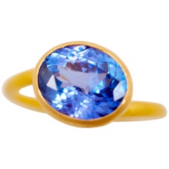 Scrives Purple Blue Tanzanite 22 Karat Gold Ring