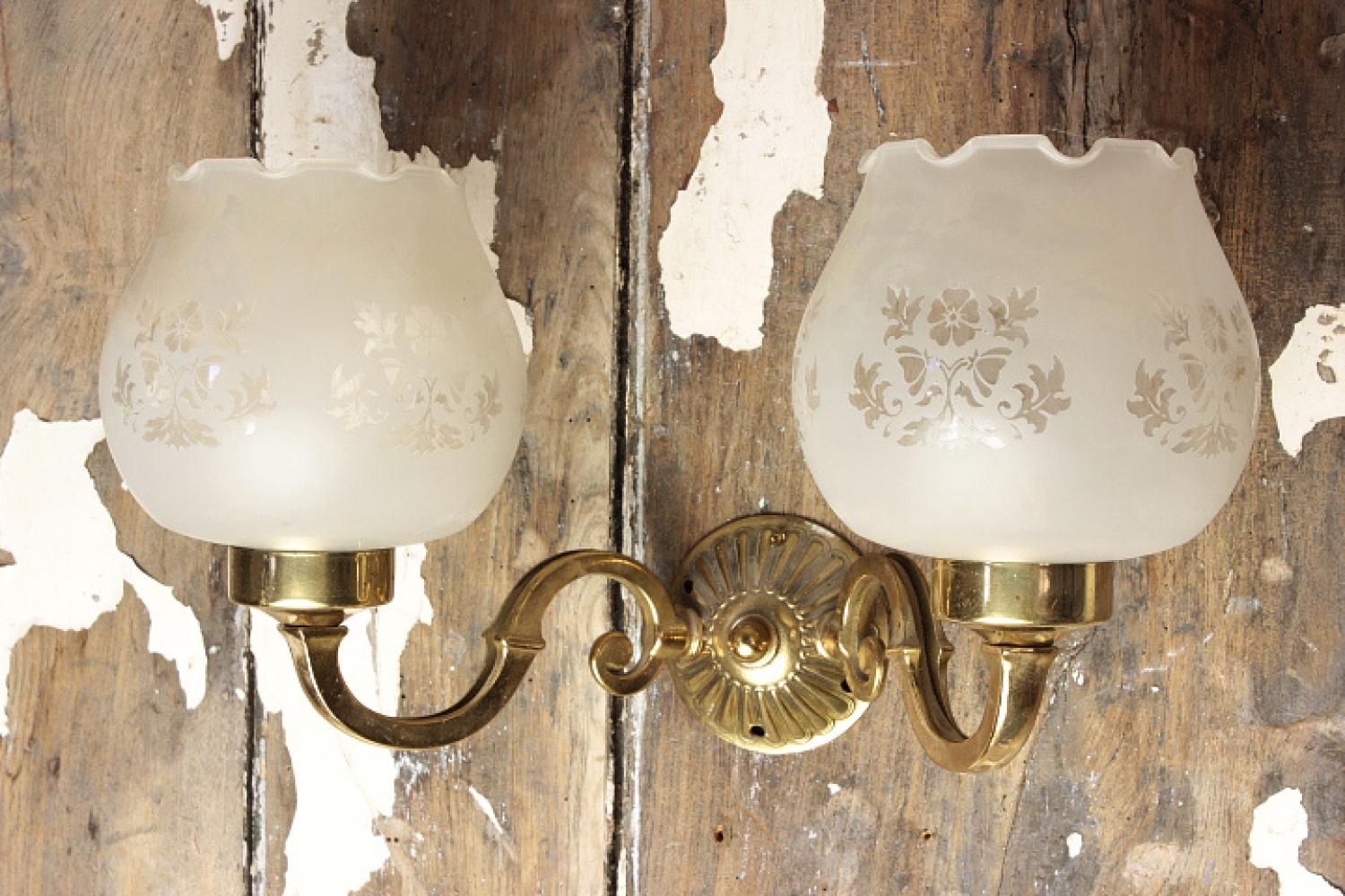Delightful etched bowl brass lamps with a classic styled cone mount and scroll arms. Shades fixed by threaded collar with floral design and shaped rims. Available stock, 3 doubles with glass shades These 3 sold / 3 doubles without glass shades / 2