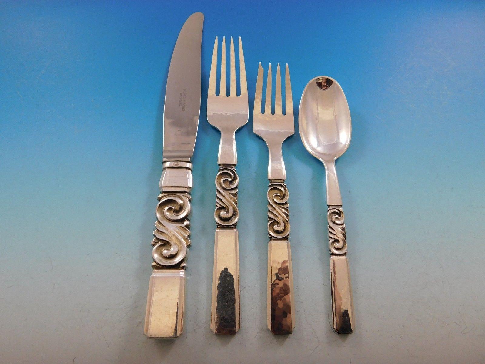 Dinner size scroll by Georg Jensen Danish sterling silver flatware set - 54 pieces. This set includes:

8 dinner knives, short handle, 9