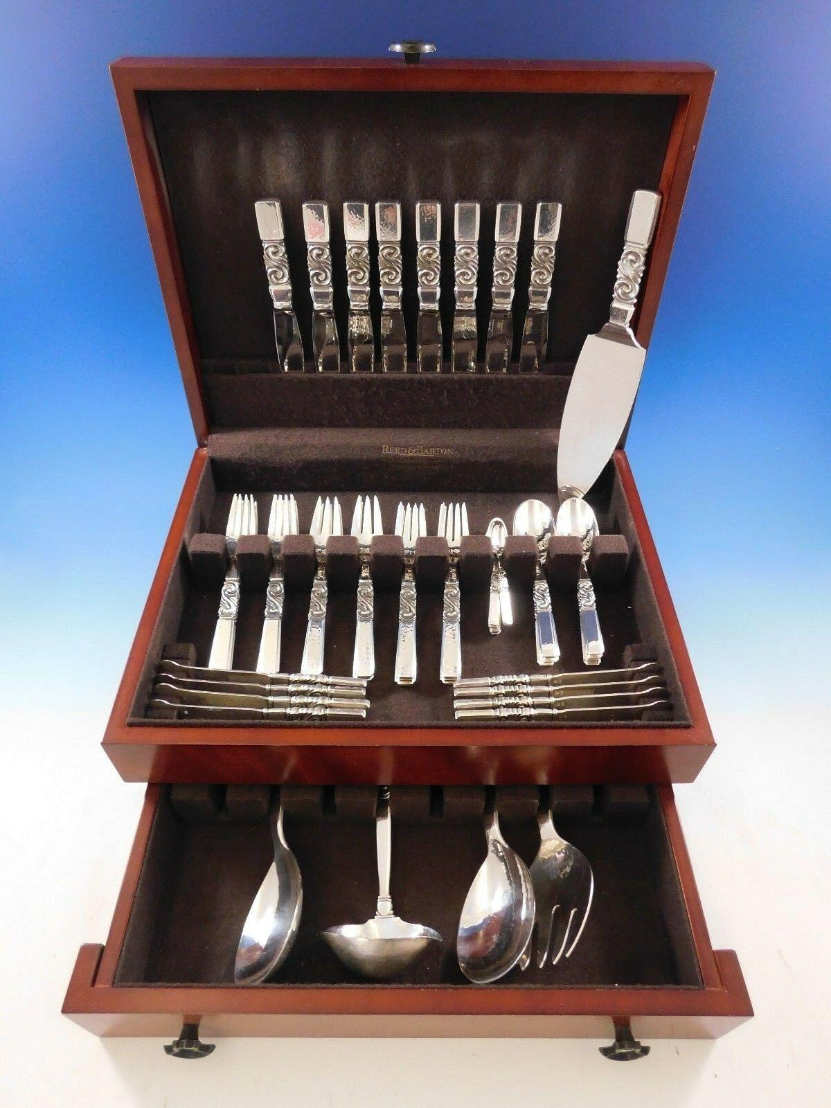 Beautiful Scroll by Georg Jensen Danish sterling silver flatware set - 61 Pieces. This set includes:

8 knives, 7 3/4