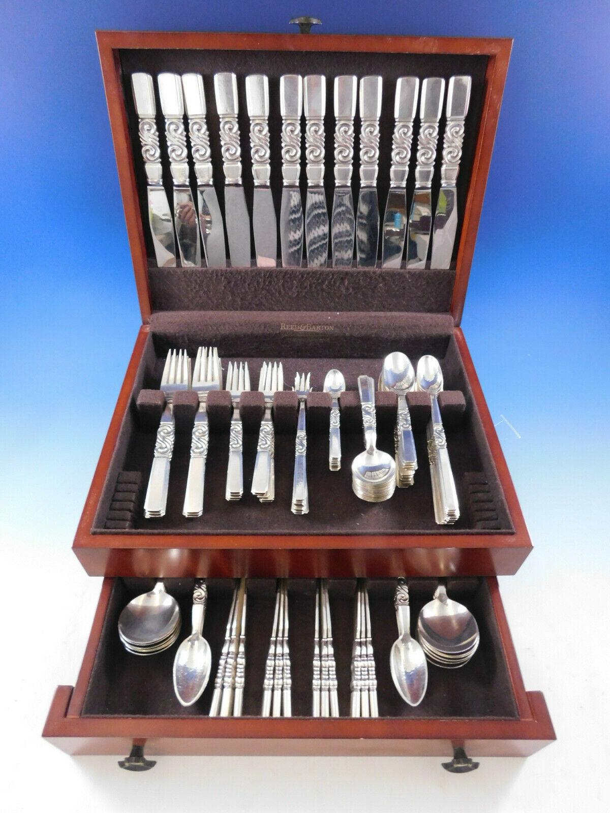Outstanding scroll by Georg Jensen Danish sterling silver flatware set with extra large European size knives and Forks - 132 Pieces. This set includes:

12 large European size knives, 9 3/4
