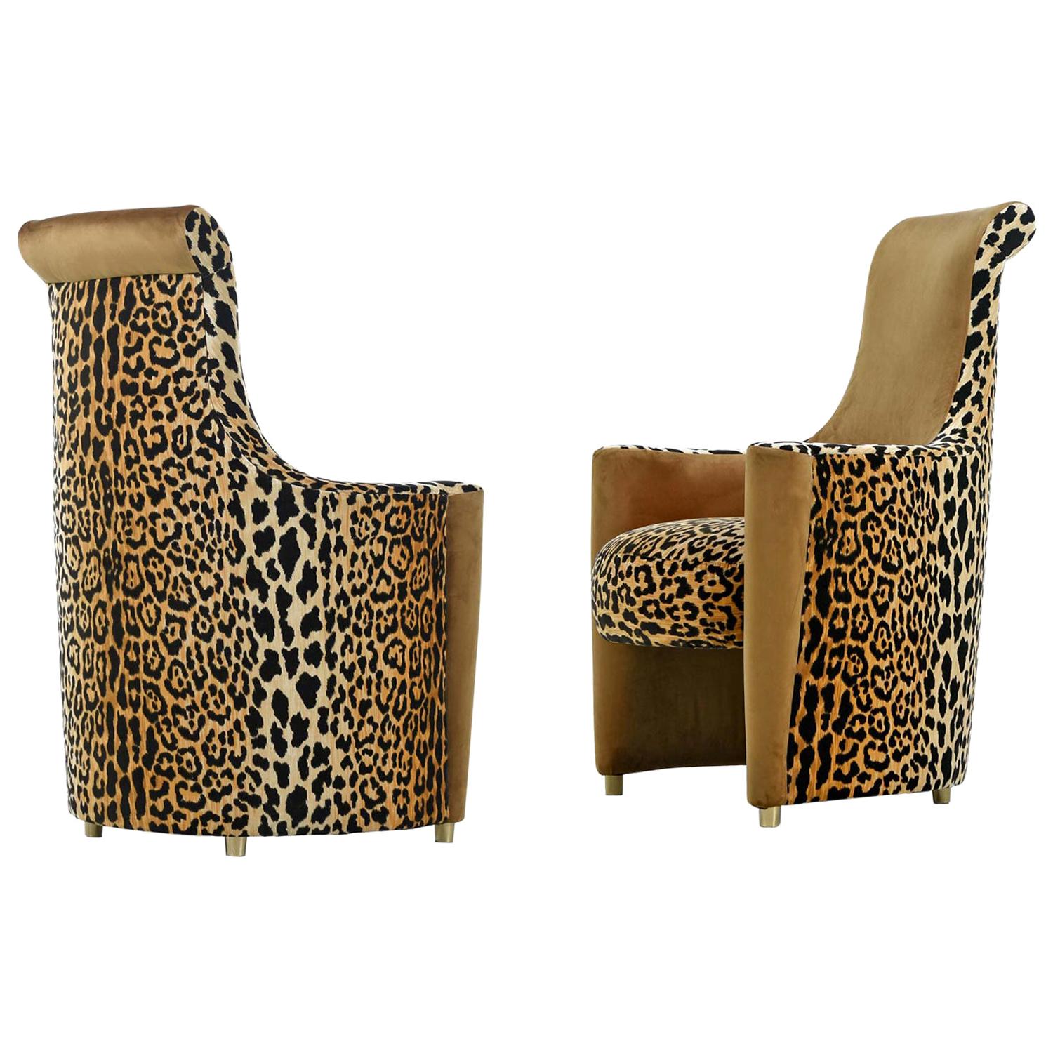 Sold as a pair.
After our in-house upholsterer (who's also a fashion designer) wrapped these high back club chairs in leopard print velvet, we realized that anything else would have been a crime. We further elevated the bold spectacle of big cat by