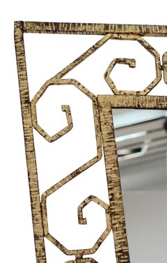 Scroll Pattern Gold Gilt Iron Shield Shaped Mirror, France, 1930s